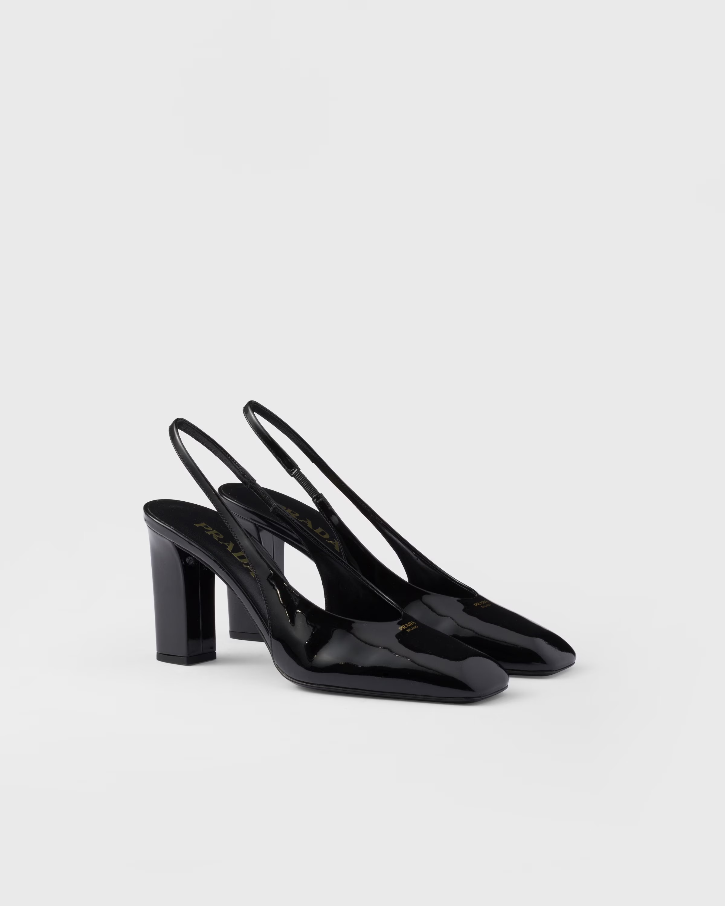 Patent leather slingback pumps | Prada US