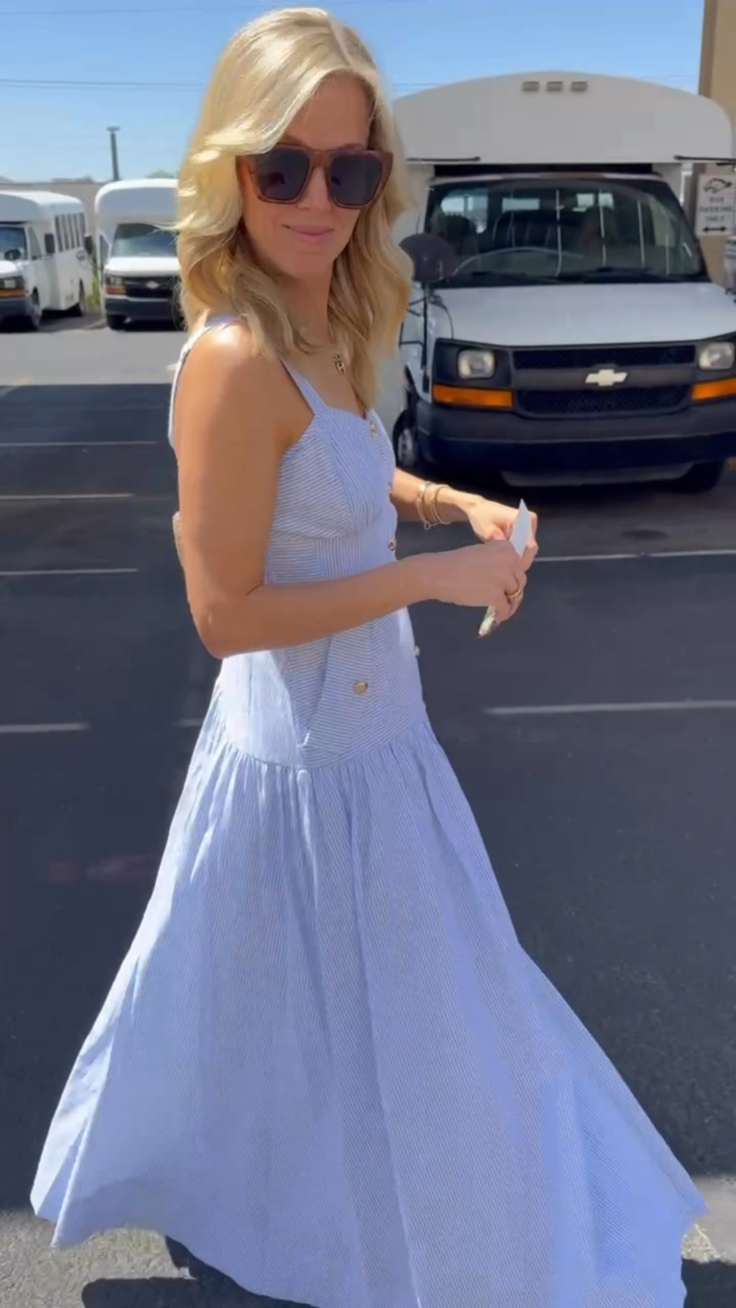 The blue + white pinstripes and gold buttons make this dress a winner 🏆  Perfect maxi dress for spring and summer events.

Ditch the sash but don’t forget to cut the loops like Gretchen did!

Runs TTS. She’s in a small. 

#LTKStyleTip #LTKOver40 #LTKWatchNow