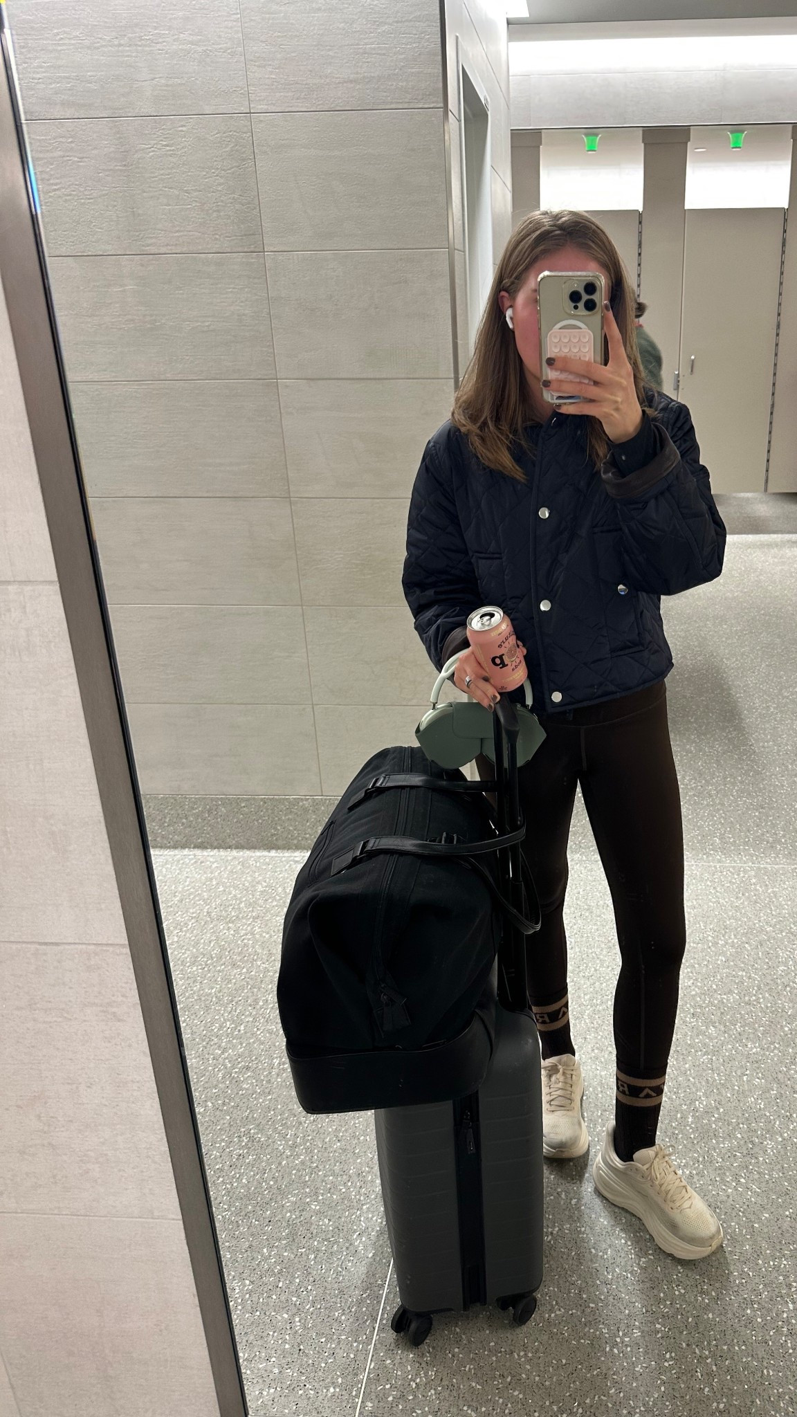 Airport chic 🤎🐻 

#Alo #ALC #varley #Hoka 

#LTKHoliday #LTKGiftGuide #LTKSeasonal