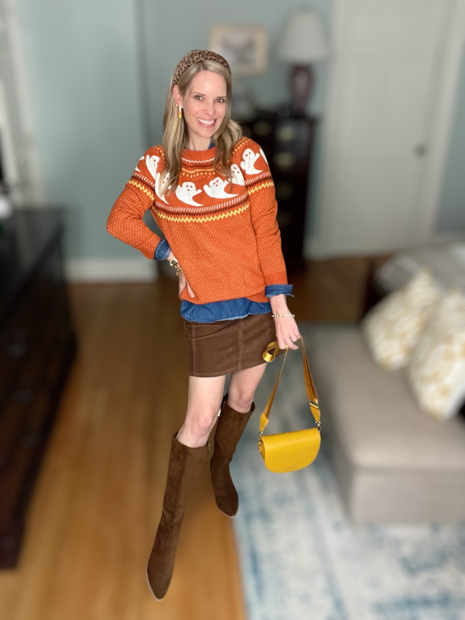 Boo-tiful & cozy 🎃 This ghost-print turtleneck sweater is the ultimate festive piece for fall! I layered it over a denim button-front shirt for a cute preppy touch, paired with a corduroy mini skirt + knee-high boots for a chic fall outfit. The pop of color from my yellow crossbody bag makes the whole look fun and playful! 🧡

For accessories, I added a leopard headband for texture and my favorite candy corn earrings 🍬—the perfect seasonal detail. Whether you’re heading to a pumpkin patch, school party, or just want a festive everyday look, this outfit is comfy, affordable, and so on theme.

🛍️ Shop my whole look below—Amazon & Walmart finds mixed with fun seasonal BaubleBar + Kendra Scott jewelry. Stylish, festive, and under budget!

✨ : Halloween sweater outfit, ghost sweater Amazon, cozy fall style, festive fall fashion, candy corn earrings, corduroy skirt fall outfit, knee-high boots outfit, affordable fall fashion finds, cute Halloween outfit for moms


#LTKItBag #LTKFindsUnder50 #LTKShoeCrush