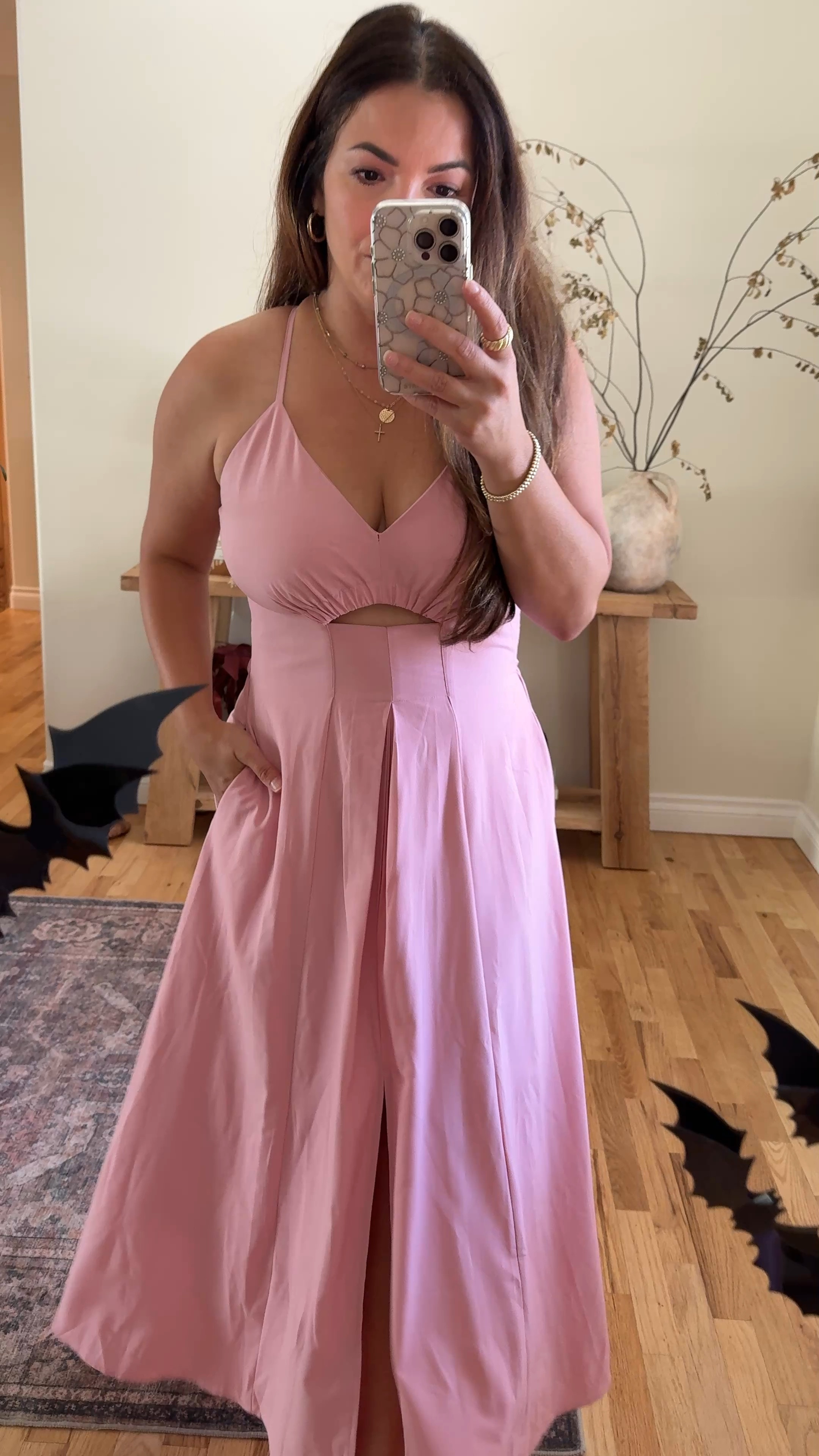 Love this dress! Looks like a pant suit with the pleated front, but is actually a dress, slit down the middle, with adjustable straps and pockets. Hits at the top of my feet (I’m 5’2). Comes in several colors and sizes.  Love the peekaboo waist too. I’m completing my look with a denim cropped jacket, but could easily throw a blazer over it with some stillettos for a more sophisticated look