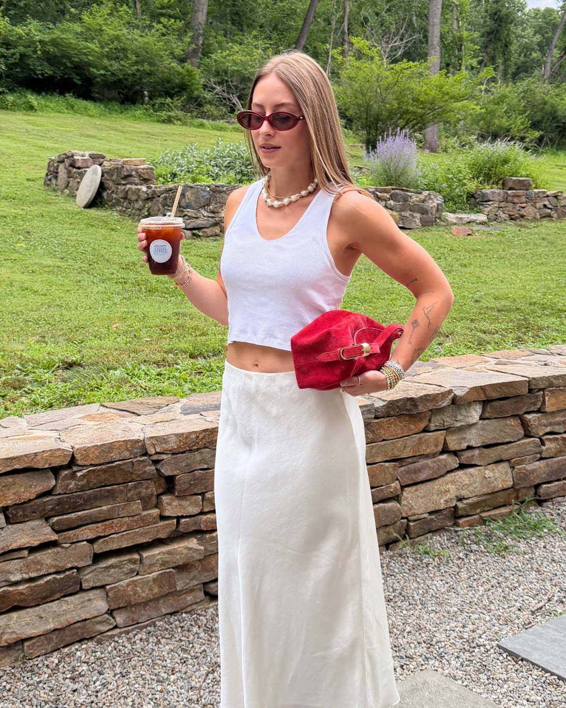 7/22/26 Casual Summer Outfit of the Day

A simple summer outfit I’ve been reaching for on repeat lately. 🤍 Paired a classic white tank with a satin midi skirt, my favorite TKEES flip-flops, red J.Crew suede bag, Amazon earrings, and Crap Eyewear sunglasses for a fun pop of color. My skirt is from Abercrombie from last year, so I’ll link the exact piece if available or a similar option. Everything I can link is linked here ✨

#LTKootd #LTKgrwm #LTKSeasonal