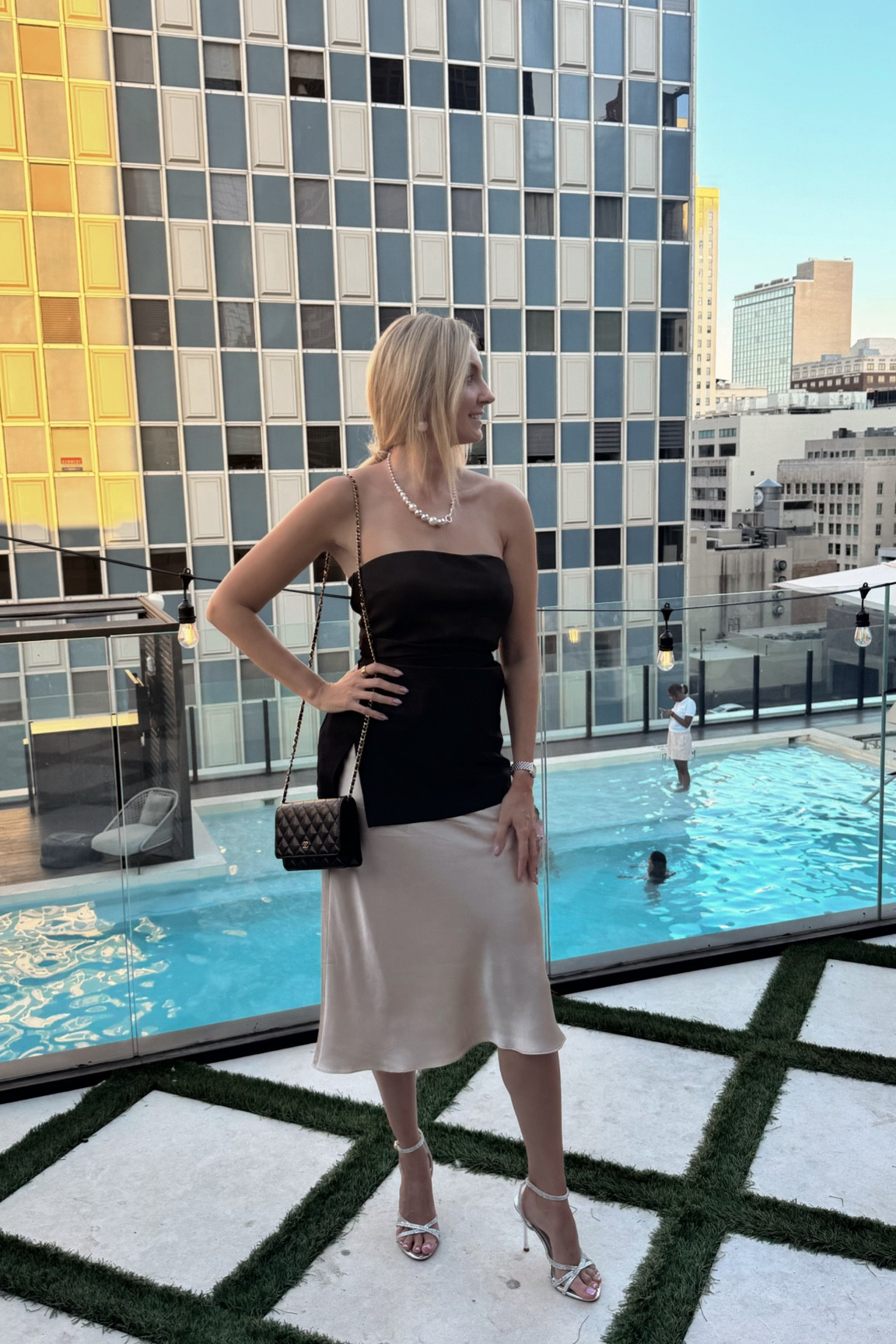 LTKCon Day 2: frosted glam attire

Satin midi skirt, black ruched strapless top, silver sandals, cocktail outfit, pearls, silk skirt, beige skirt, bandeau top, party look, metallic shoes, pearl necklace 

#LTKParties #LTKShoeCrush #LTKCon