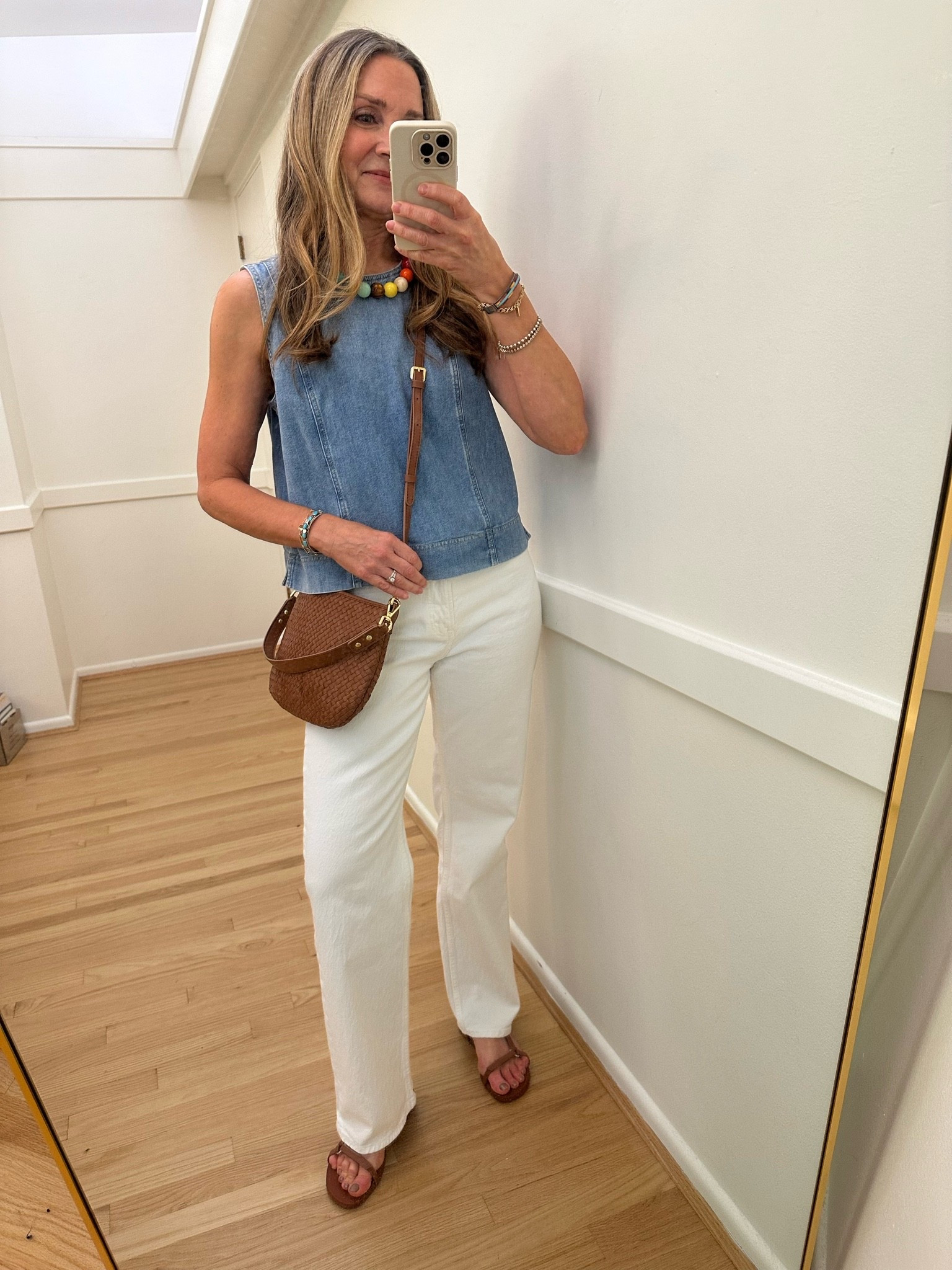 Summer outfit of the day!

@Spanx denim sleeveless shell top, @abercrombie curve live white jeans, @Quince crossbody bag, @frankie4 waterproof leather sandals.

#LTKootd #LTKOver40 #LTKxAbercrombie