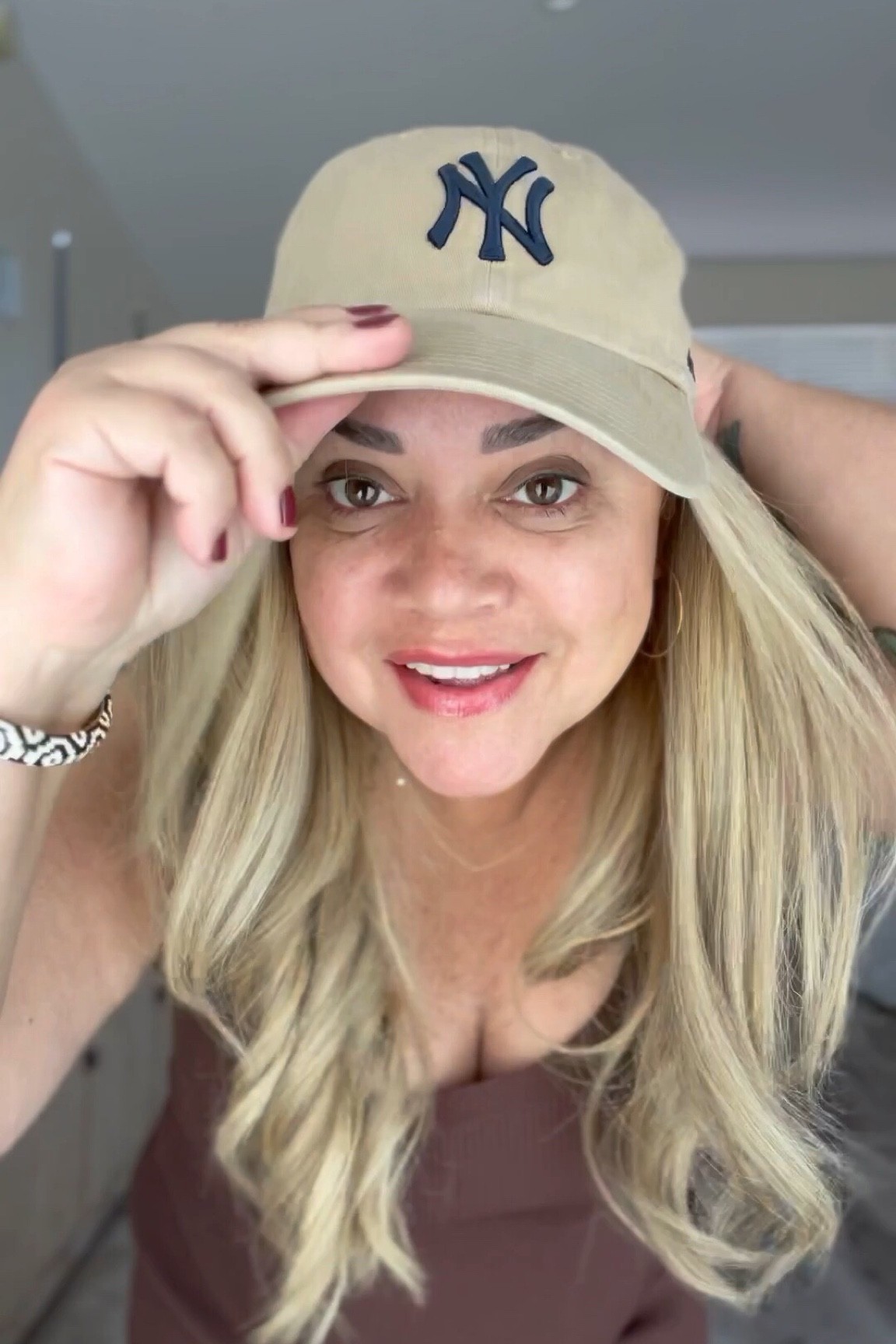 Casual outfit, Nike sneakers, Yankee hat, brown dress, jeans shirt, white dupe lululemon bag.

#LTKtravel #LTKstyletip #LTKcurves