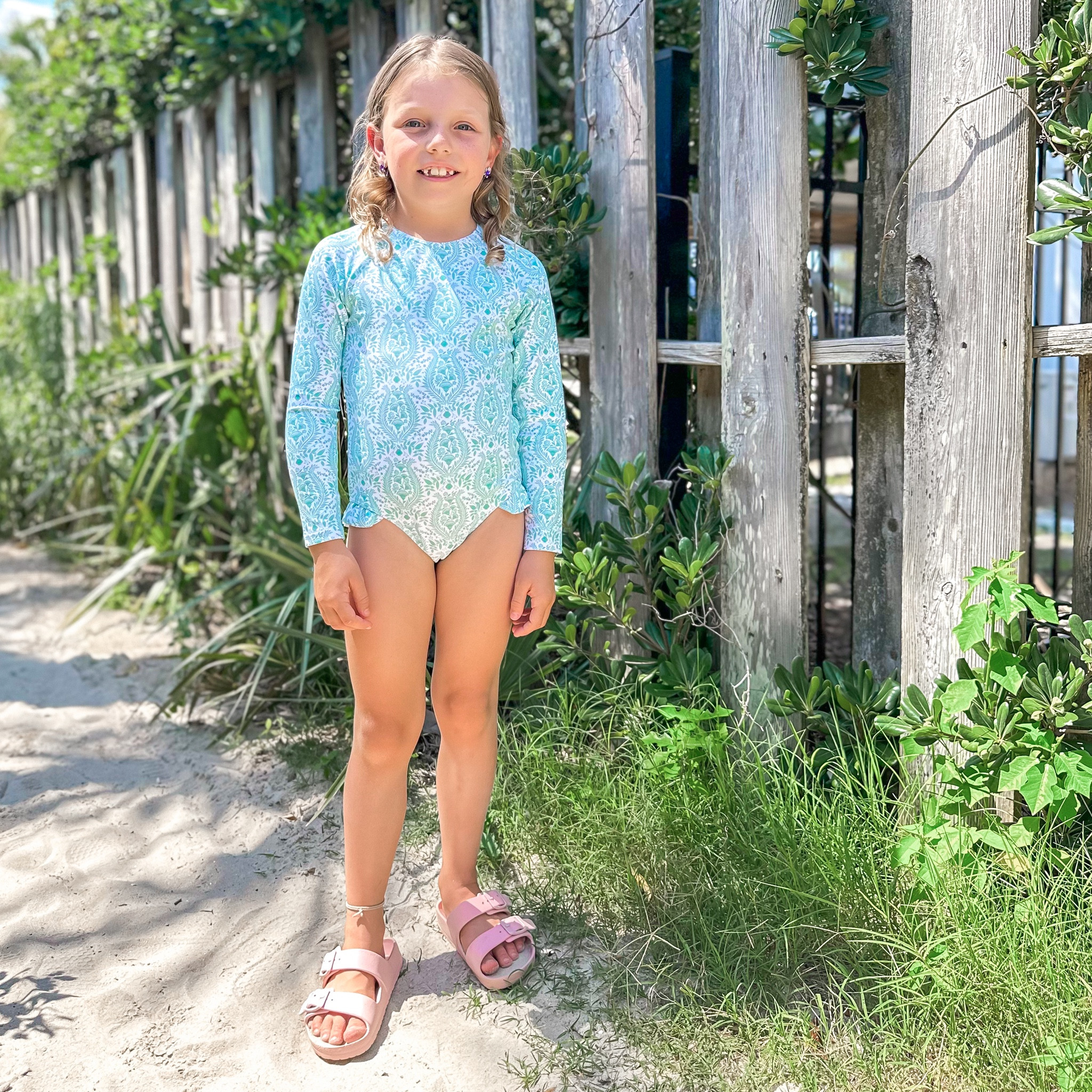 Girls swimsuit in gorgeous green.  Shoes are on sale $7 at Target. 

#minnowswim #swimsuit #kidsfashion #kidsswim #swim #rashguard #beach #target #targetstyle 

#LTKswim #LTKsalealert #LTKkids