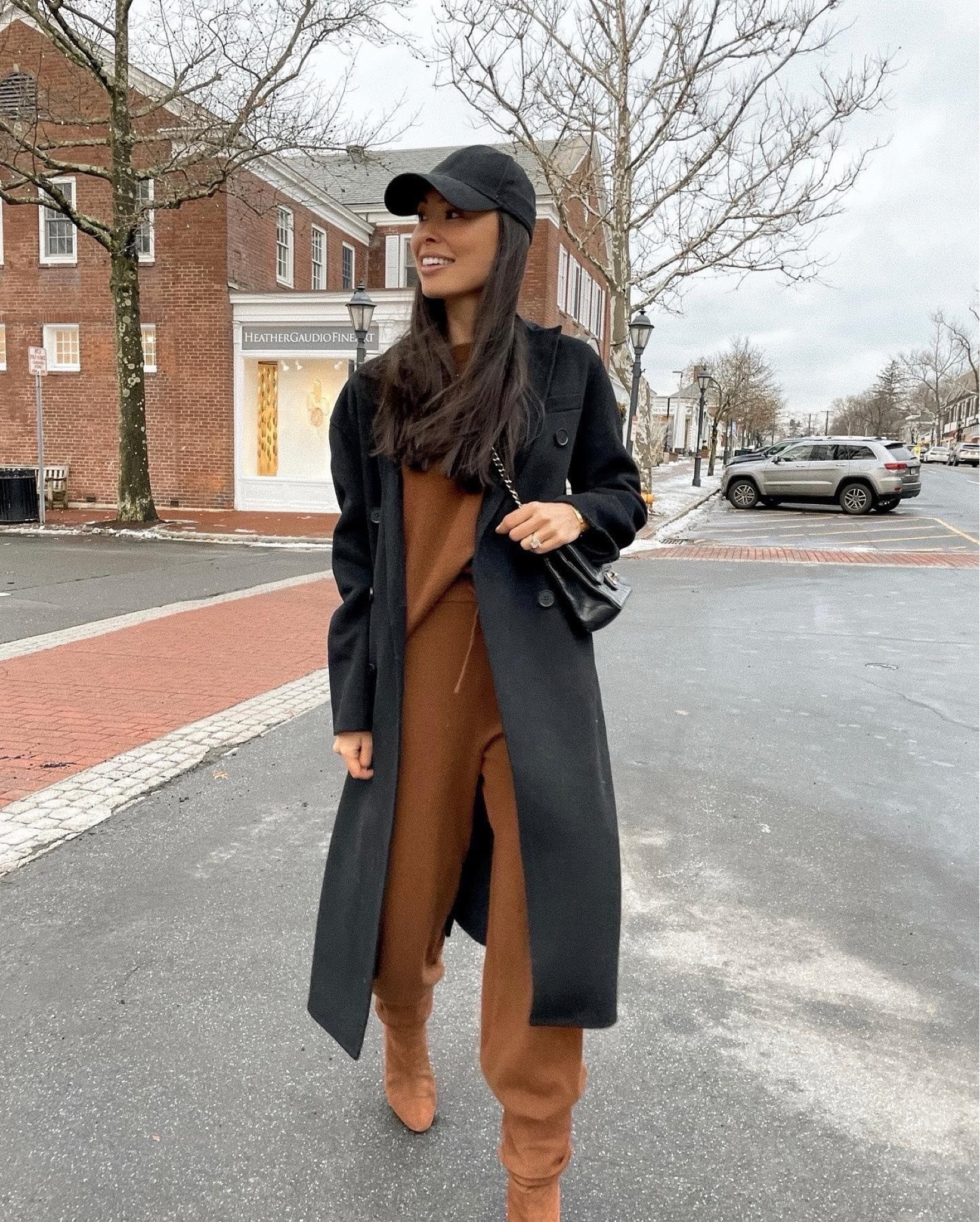 Kat Jamieson of With Love From Kat wears a fall outfit. Neutral sweater, brown boots, black hat, black coat, fall style, neutral outfit. 

#LTKSeasonal #LTKstyletip