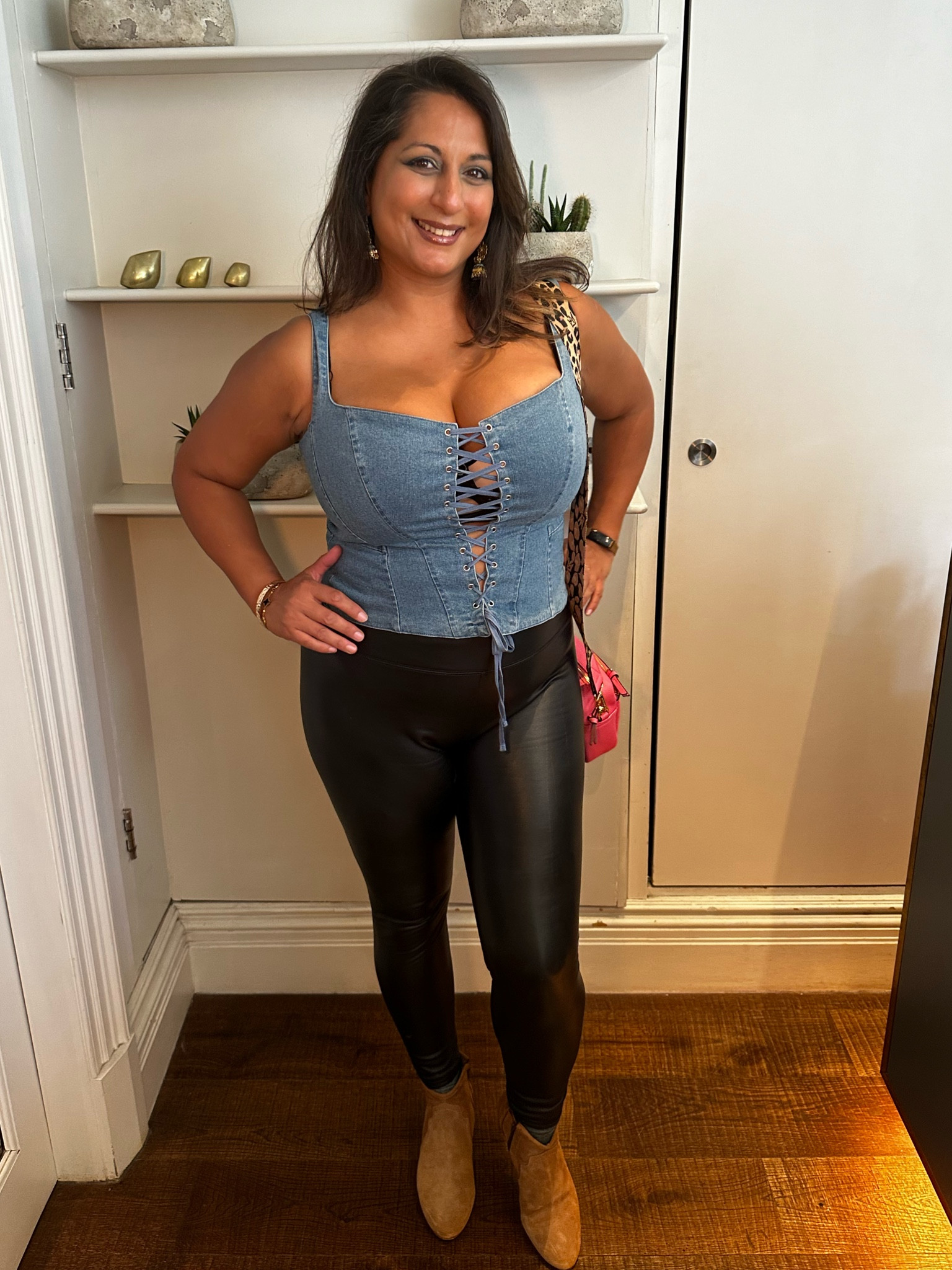 Faux leather trousers and denim corset 