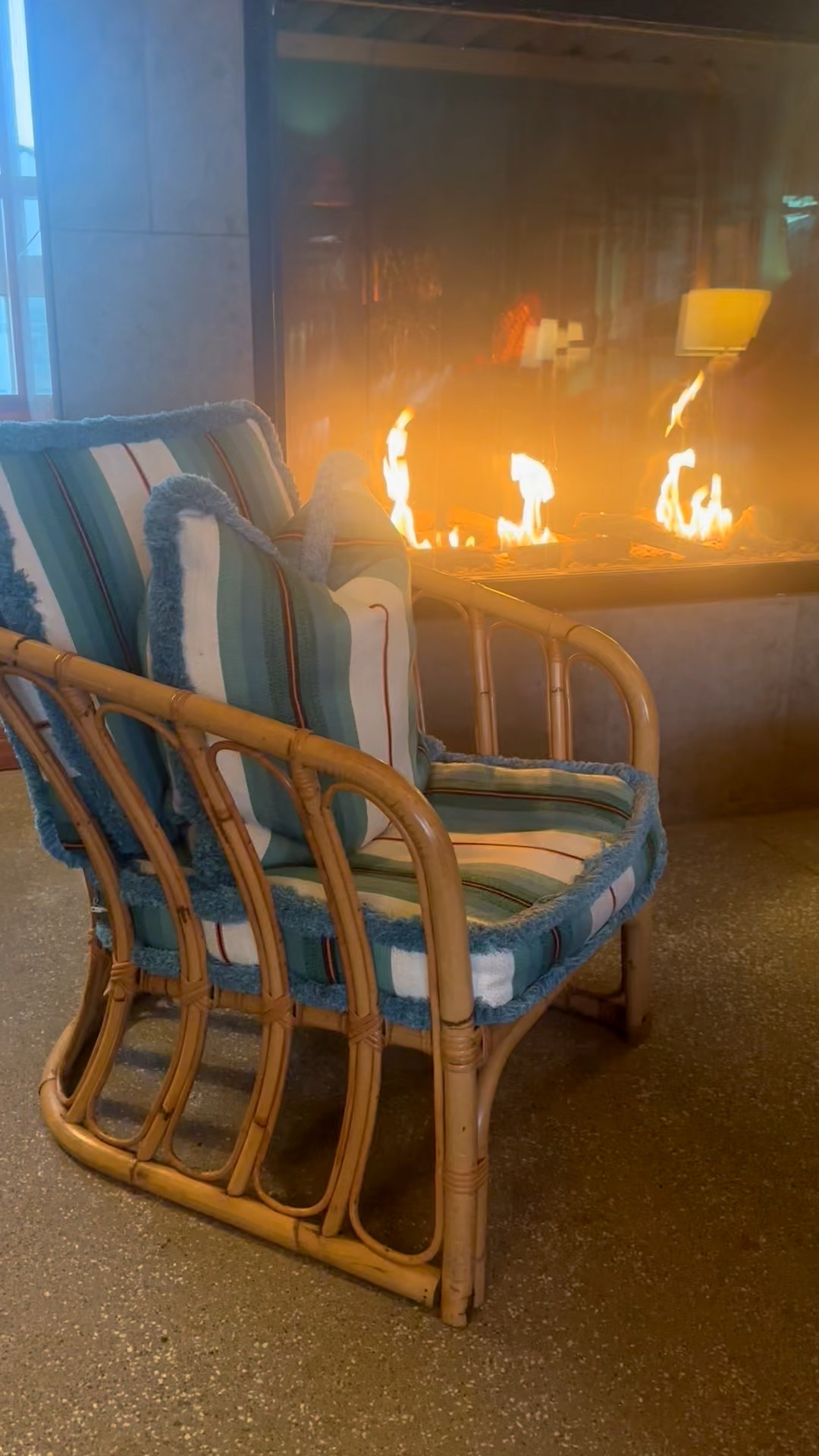 Unwind in style ✨ Cozy up by the fireplace in a chic rattan lounge. #RattanLounge #FireplaceVibes #CozyElegance #RelaxInStyle #InteriorMood #TimelessDesign

#LTKdayinmylife #LTKvlog #LTKHome