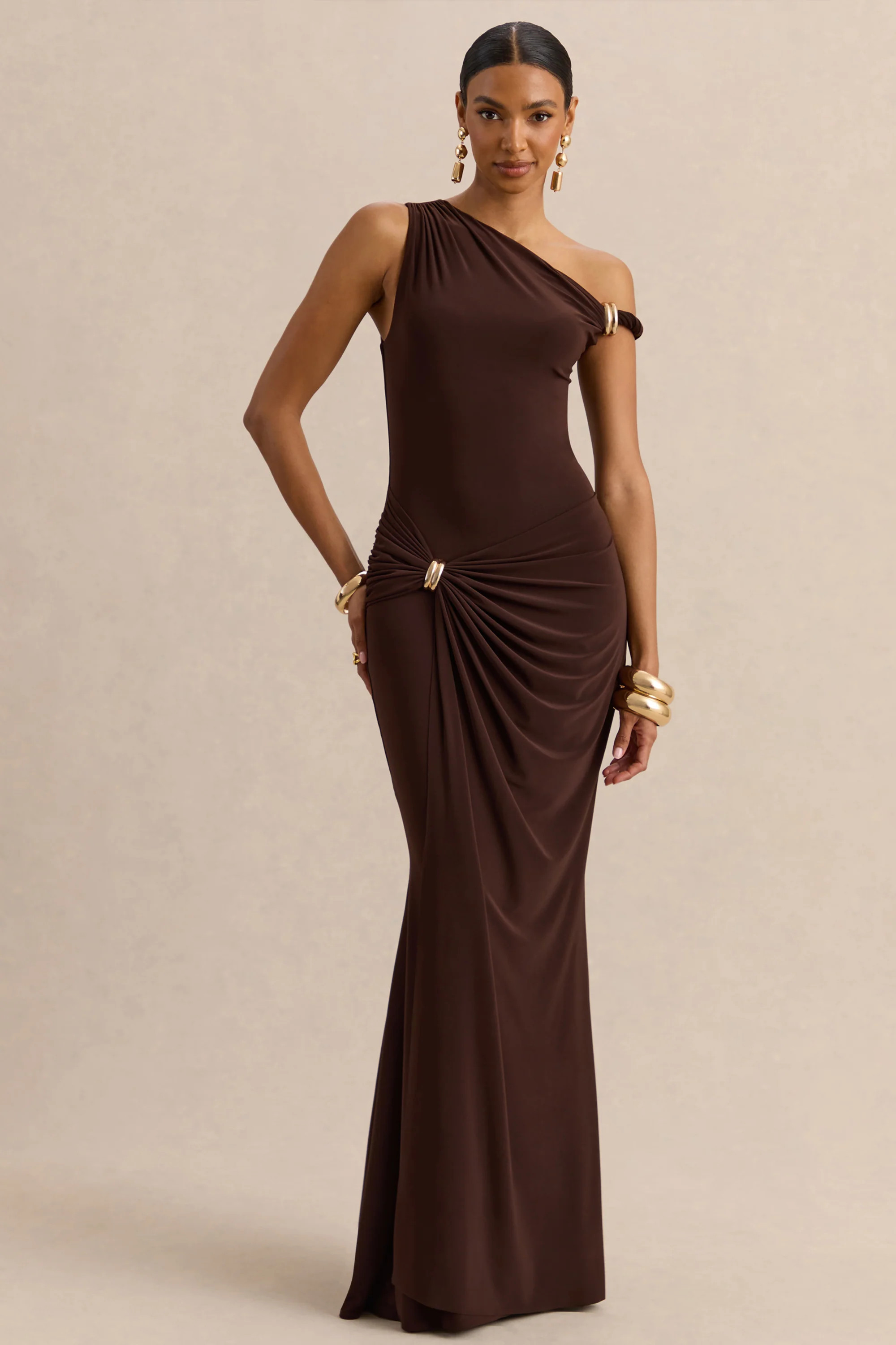 Caelia | Brown Asymmetric-Neck Maxi Dress With Gold-Detailing And Sash | Club L London