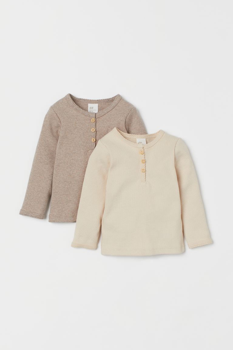 Baby Exclusive. Long-sleeved tops in ribbed, organic cotton jersey. Button placket and scalloped ... | H&M (US + CA)