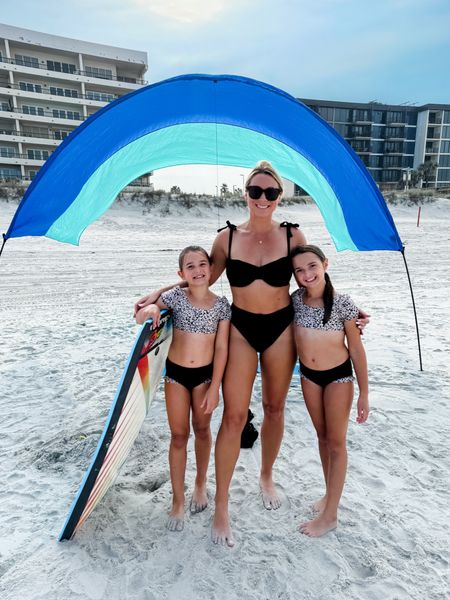 Making our favorite place even better 🌊☀️ 

#ad @shibumishade is a lightweight canopy that provides UPF 50+ sun protection for up to 6 people. Set up was so easy and fast (under 3 minutes). It’s our new favorite beach accessory. Tag a bestie who loves the beach 💛

Save 10% with code: CAROLANN10
*good through 5/25

#fathersday #memorialday #swimsuit #familyswimsuits #familymatching #vacation #beach #pool  #momlife #sisters #resort #bathingsuit #beachcanopy #family #amazonfinds  
#girlmom #summer #summerbaskets #summerbreak #ltkfamily #ltkkids #LTKswim #ltktravel 

