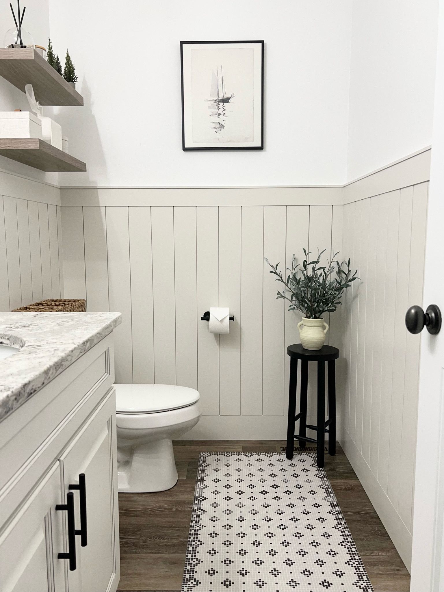 Bathroom / white bathroom / soap dispenser / hand towels / black fixtures / arched mirror / black mirror / black faucet / everlasting candle / wood tray / black hardware / seagrass basket / waste basket / target home / Amazon home 

#LTKunder50 #LTKunder100 #LTKhome