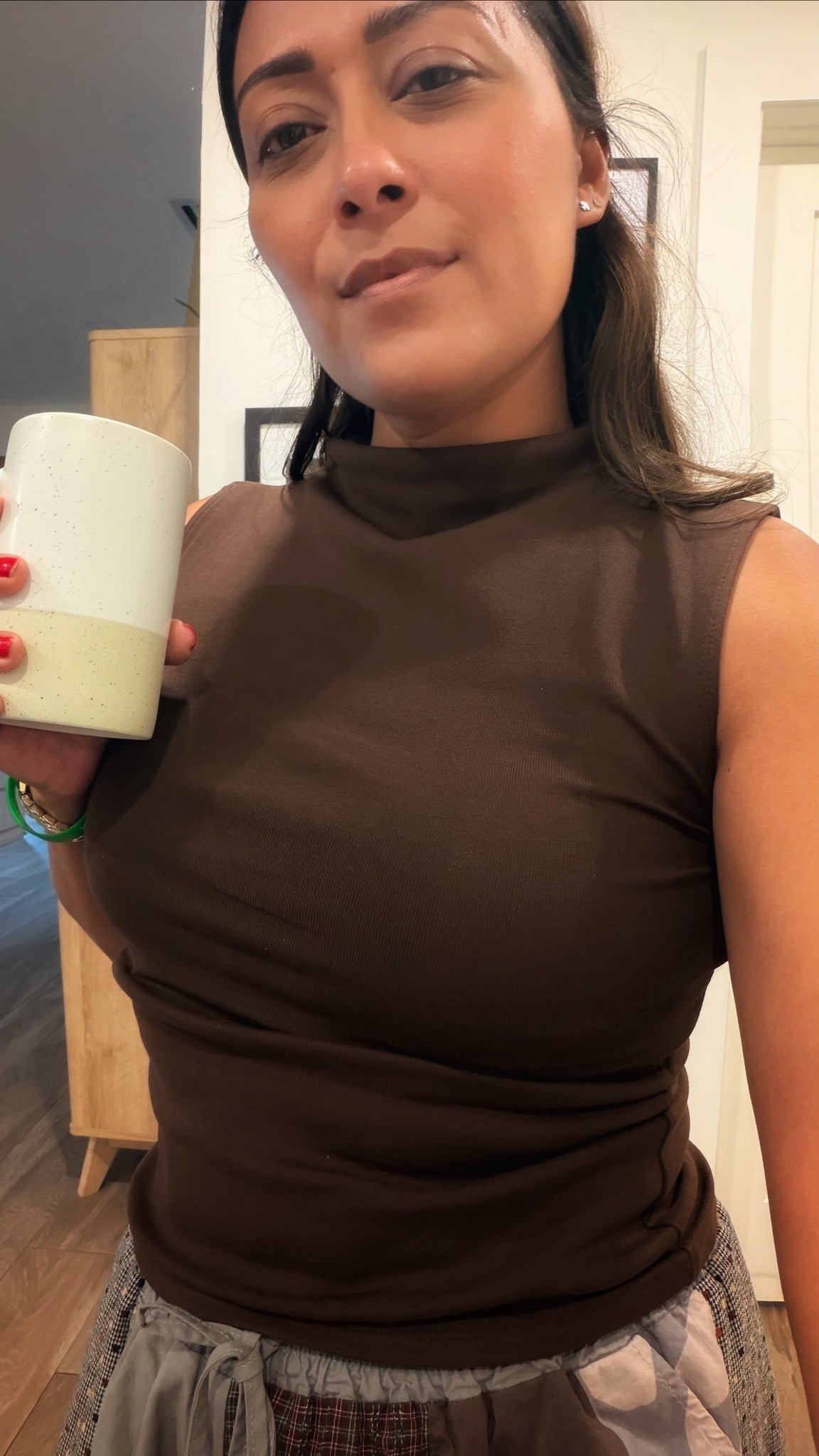 I love this tank top, the color is beautiful. Perfect for fall and perfect for Florida weather. It has that mock turtleneck but not too high so it’s perfect for the fall in Florida!

#LTKOver40 #LTKootd