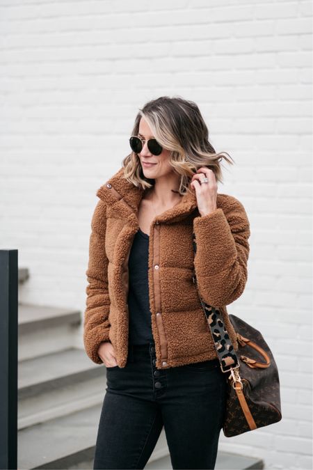 I bought this mini puffer last year after having it on my list for awhile. So glad I did because I’ve been wearing it a lot this year, too. My exact version is long sold out, but I’ve linked the same style below. They have a vegan leather option that is so cute. I’m wearing small and it’s on sale  

#LTKsalealert #LTKunder100 #LTKstyletip