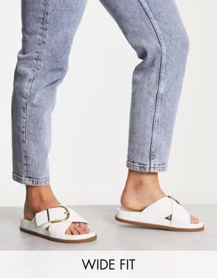 ASOS DESIGN Wide Fit Flash buckle cross vamp flat sandals in white | ASOS (Global)