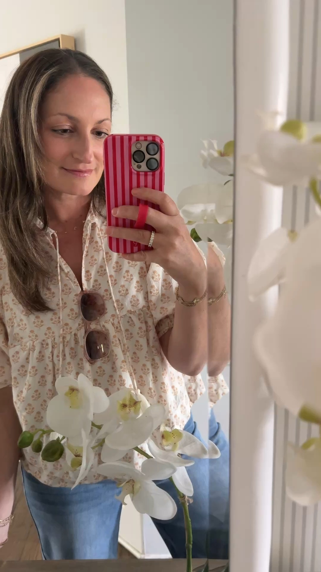 Heading out to dinner! Wearing the prettiest lightweight top from Mara, jeans from Social Threads, sunnies and my favorite easy, looks great on everyone, lip gloss. 

#LTKdayinmylife #LTKootd #LTKBeauty