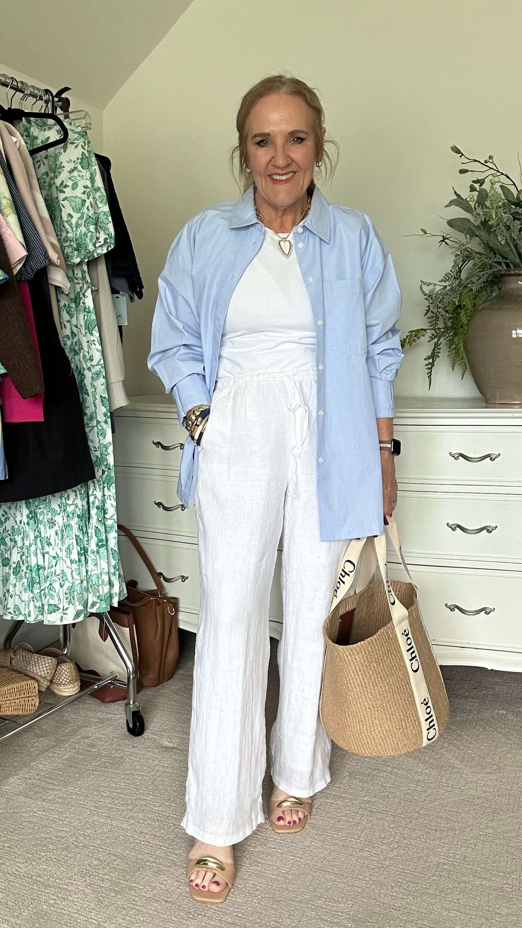The regular length white linen pant is just right. Wearing size medium. They are fully lined and the nicest drippy linen out there. I would splurge on the white linen pants here and for a different color I would get the quince linen pants. I will link those two.

My blue Oxford button-down is size medium. It is very oversized and I love it. But you could size down if you don’t want it this big. 
My white tee is by Quince and I’m wearing a size large 

Old Navy and J.Crew factory have good options for white linen pants that are longer and less expensive. It’s just not as pretty of a fabric and they are not lined.

Chloe bag designer bag JCREW soleil pant 

#LTKFindsUnder100 #LTKWatchNow #LTKOver40