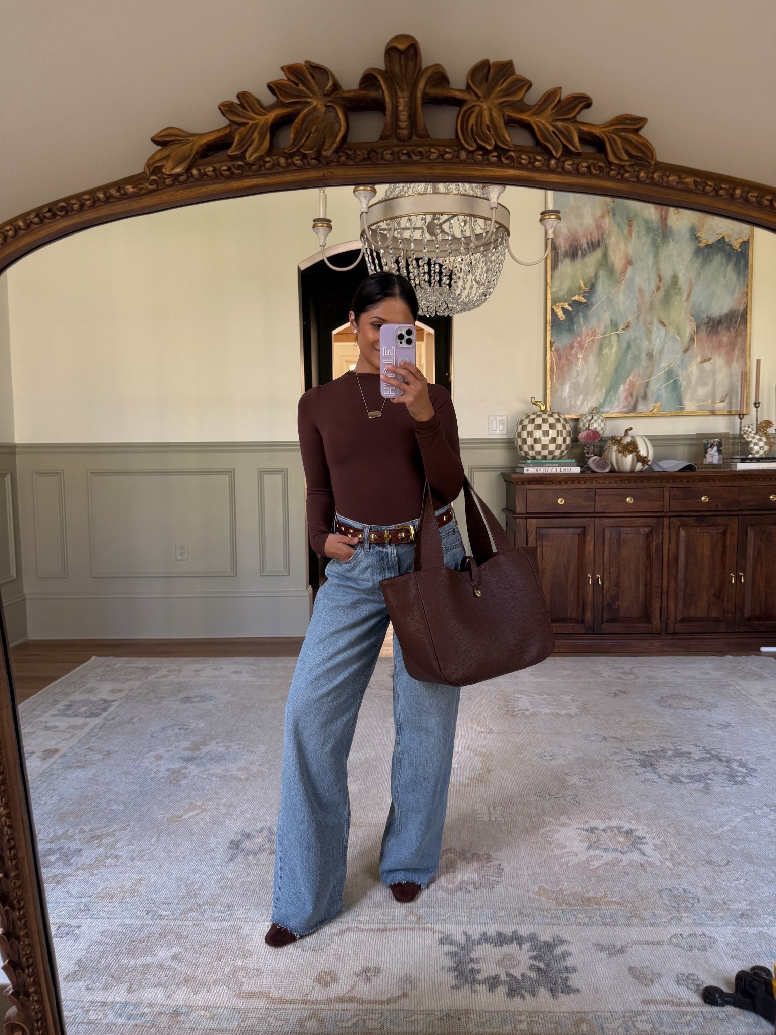 Obsessed with these low rise jeans! I’m wearing the size regular 26 here so I can wear with heels. I could size down to the 25 but I like the loose baggy fit of the 26! 
Take 20% OFF my Gigi New York bag with code: HAUTE20


#LTKFindsUnder100 #LTKSaleAlert #LTKCyberWeek
