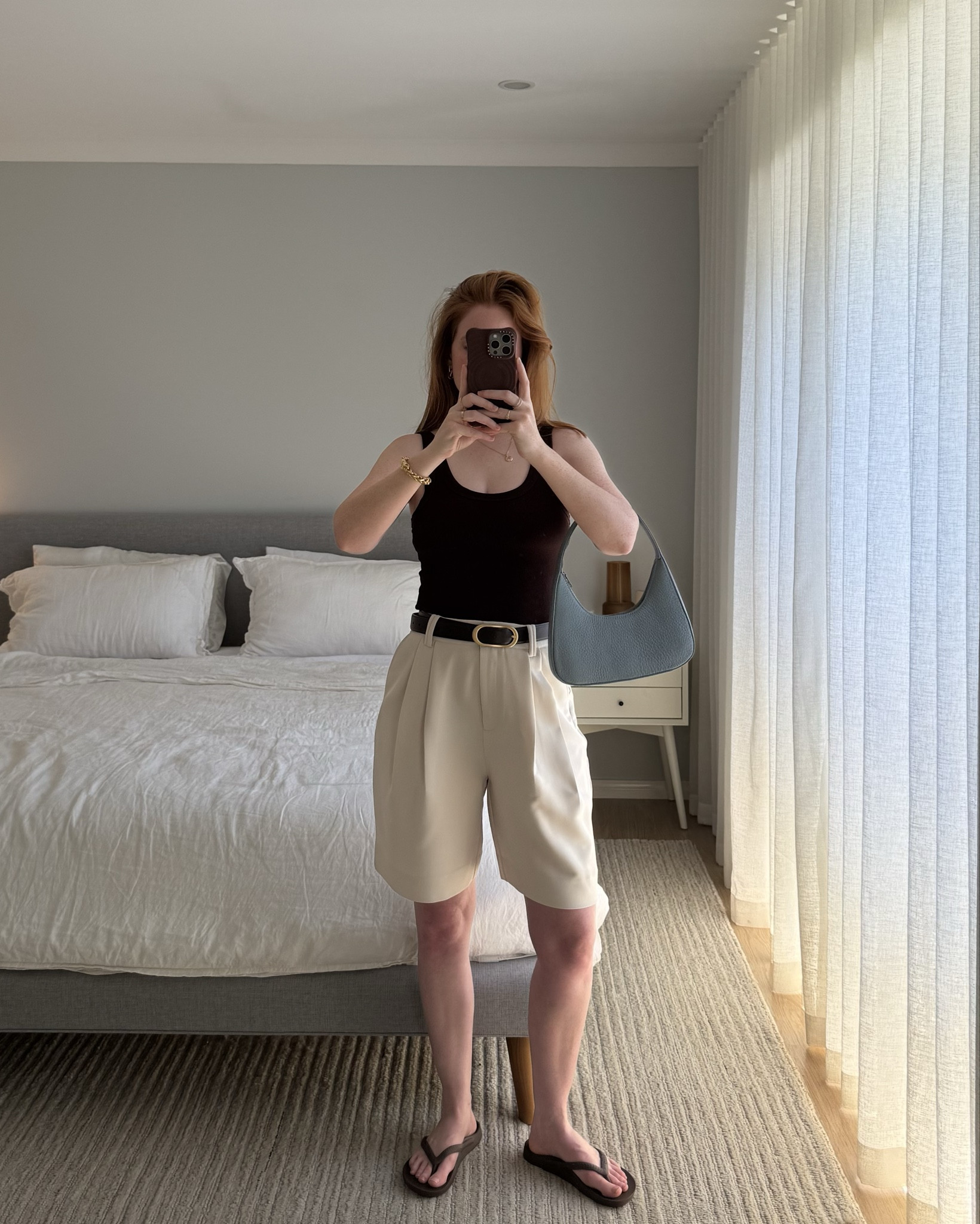 A comfy and casual OOTD with effortlessly chic tailoring. How cute is my structured Status Anxiety bag in the most perfect powder blue btw?!

I’m wearing a size XS in the DISSH brown tank top and a size 8 AU in the off white tailored bermuda shorts.

#LTKsummer #LTKaustralia