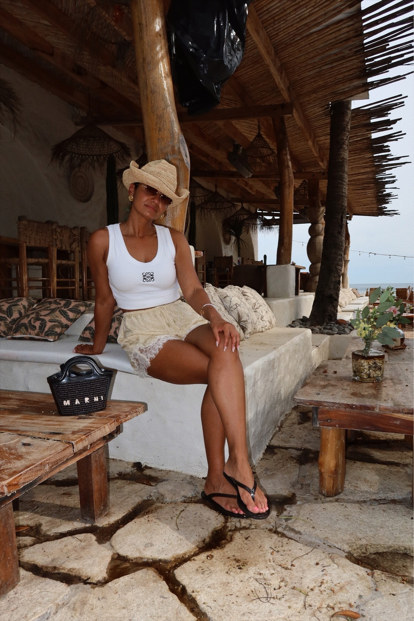 Beach look at El Salvador!! Love a comfortable look but still look stylish. Shorts are Zara xs . My new Marni bag that I’m obsessed with. Zara sandals..