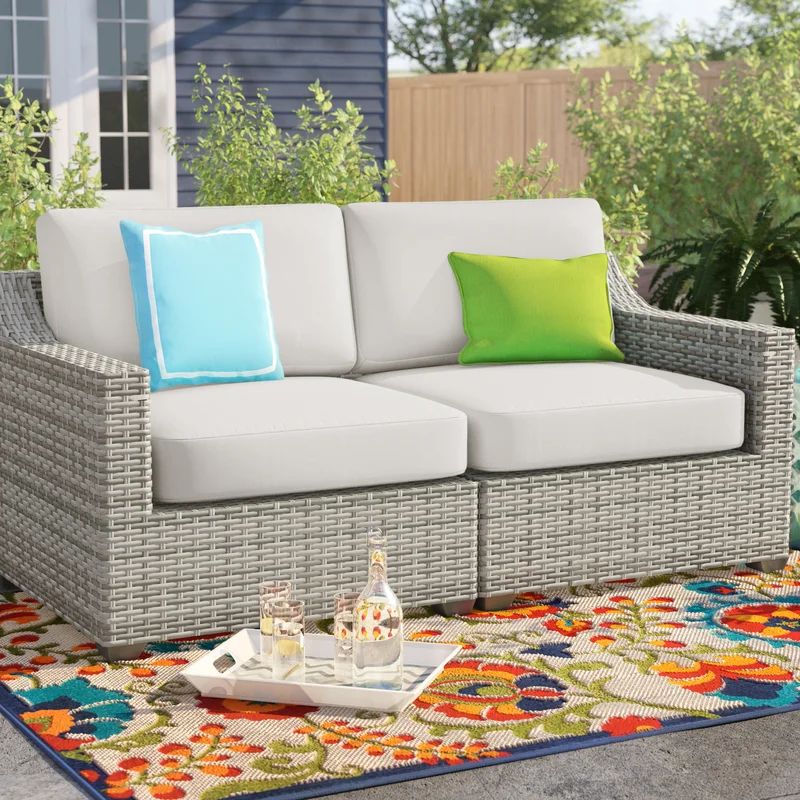 Falmouth 70" Wide Outdoor Wicker Loveseat with Cushions | Wayfair North America