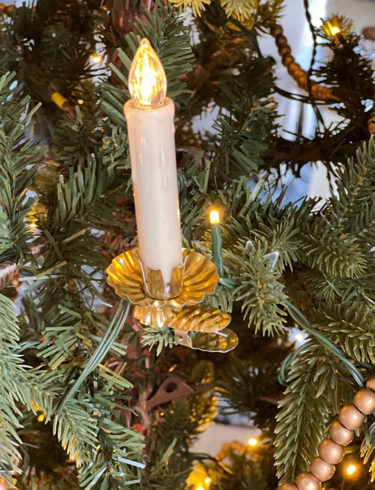 I love these battery operated clip on candles for our Christmas tree! I love them even more with these gold Christmas candle clips added to replace the green they normally have for a base. They add a nostalgic & vintage feel and keep my tree safe and pretty!

#LTKHoliday #LTKhome #LTKSeasonal
