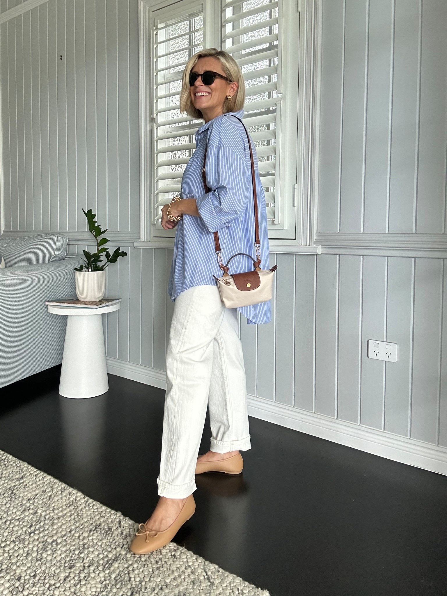 Midweek lunch style - an overdosed Oxford-style shirt with white straight leg jeans and a mini bag with flats. 

Jeans: size 29. These are the ankle length  

#LTKpetite #LTKaustralia #LTKjeans