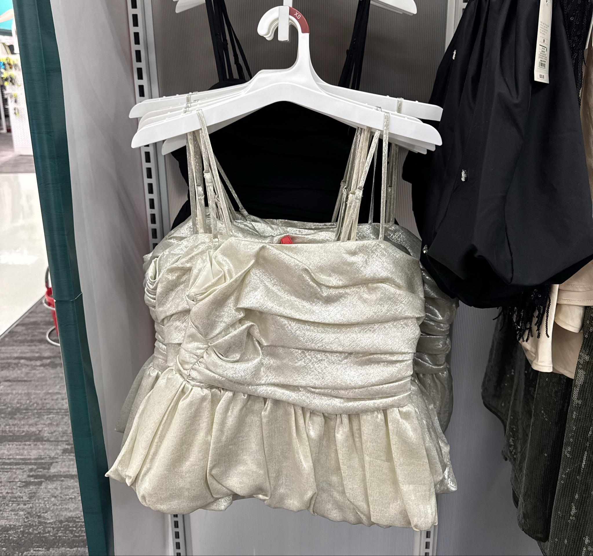 Happy Tuesday!☺️ Clearance finds!!🙌🤩 This ruched peplum cami top is so pretty for an NYE outfit!!🎉🥳 It’s 20% Off and comes in these 2 colors! I love both!!😍 Black is gorgeous that can go with just about anything and is classy!!🖤🥰 The shimmer on the other one is so pretty for any party and screams fun!!✨😁 Great to wear afterwards for a date night, girls night out, Valentine’s date night, or a formal event! Which color do you want?🤔 

#targetclearance #clearancefinds #nyeoutfit #peplumtop 
#datenight #valentines girls night out 
Holiday party, party 

#LTKSaleAlert #LTKFindsUnder50 #LTKOver40