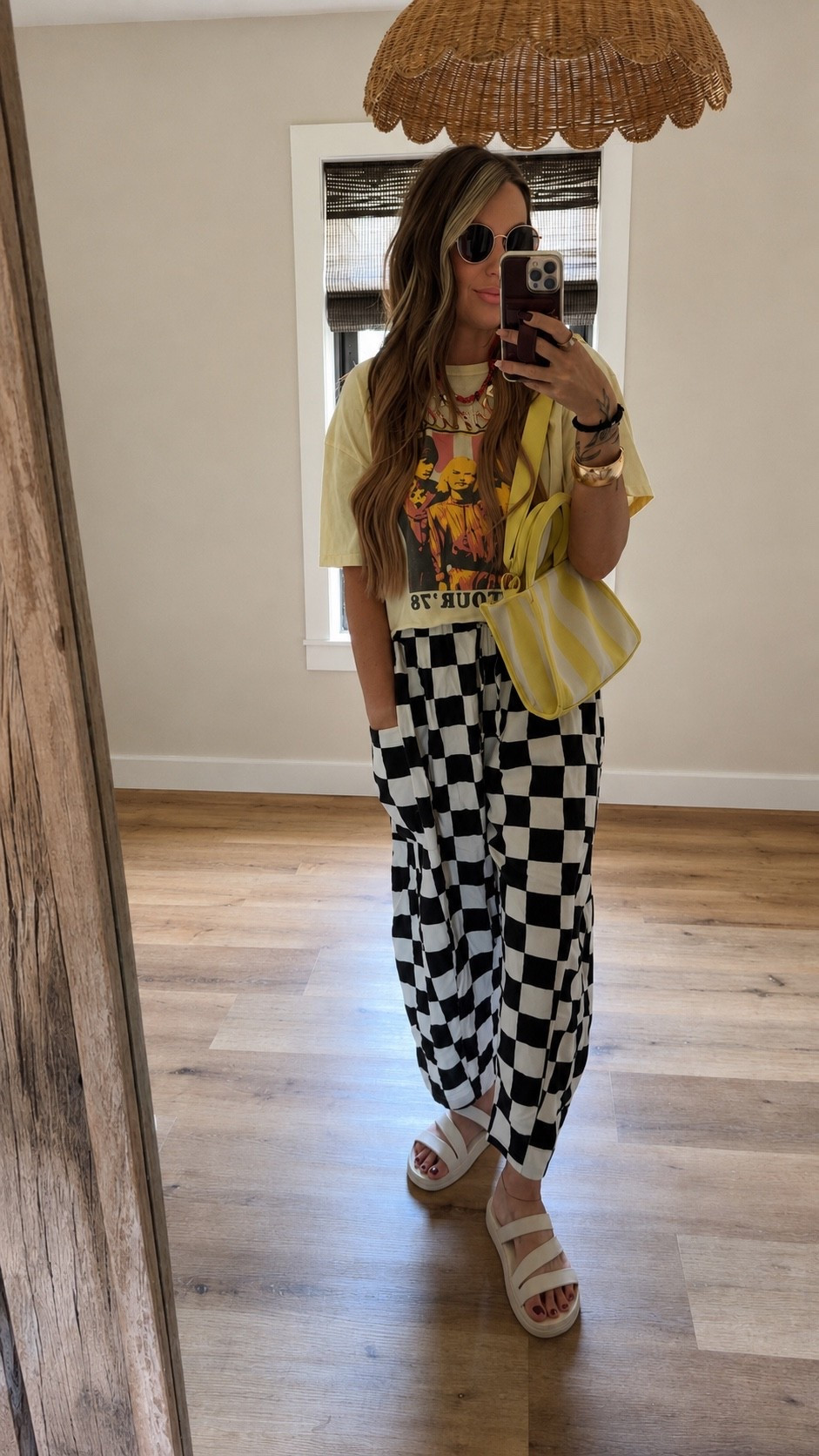 LOVE these checkered linen pants. Loose fit. Great piece for fall. I’m in a size small. 155 pounds 5’7”. This crop blondie graphic tee is from @Walmart and only $9.98! This purse is a favorite as well. Cute yellow stripe. My shoes are crocs but omg THE most comfortable. I have them in the mocha color as well. Going grocery shopping and needed comfy shoes! My necklace is a statement charm necklace from @dillards - it was on clearance but I linked a couple similar I found online!

#LTKMidsize #LTKootd #LTKTravel