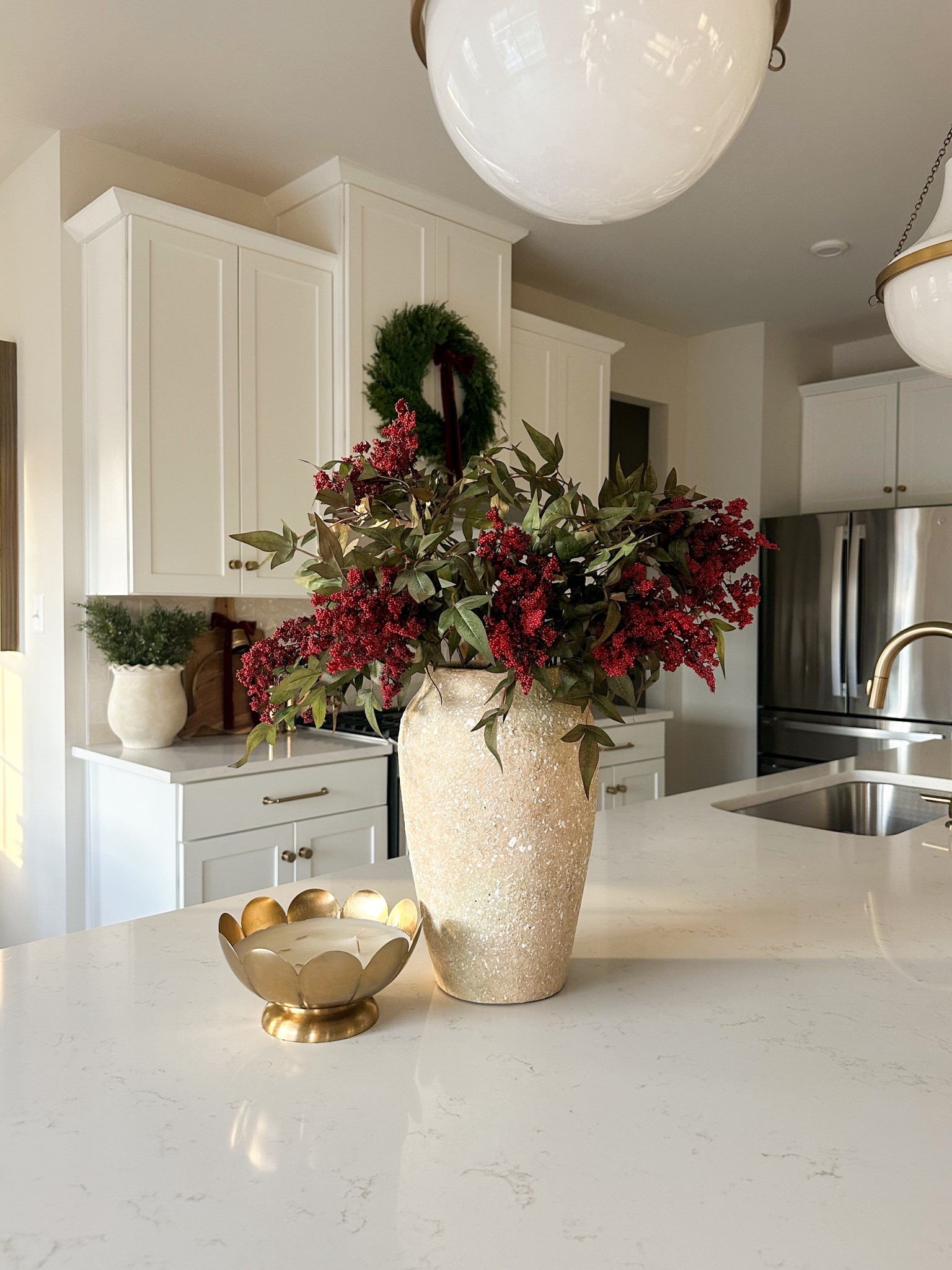 Kitchen island holiday decor. These red berry stems have been coming in and out of stock. They come in a set of 3 and I have 3 stems I this vase. They’re absolutely stunning! 
#holidaydecor #christmasdecor #redberrystems #vase #amazon #potterybarn #whitekitchen #holidaykitchendecor

#LTKSeasonal #LTKFindsUnder100 #LTKHoliday
