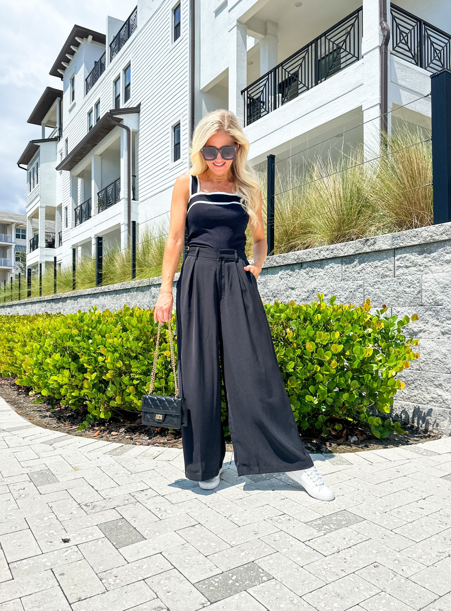Amazon elevated casual outfit idea giving me Chanel vibes! Sweater tank comes in more colors. Palazzo pants are very comfy and has elastic in the back. They come in short length. Purse can be a shoulder bag or crossbody. Cute sneakers are very comfy and have small platform. 

#LTKFind #LTKunder50 #LTKswim