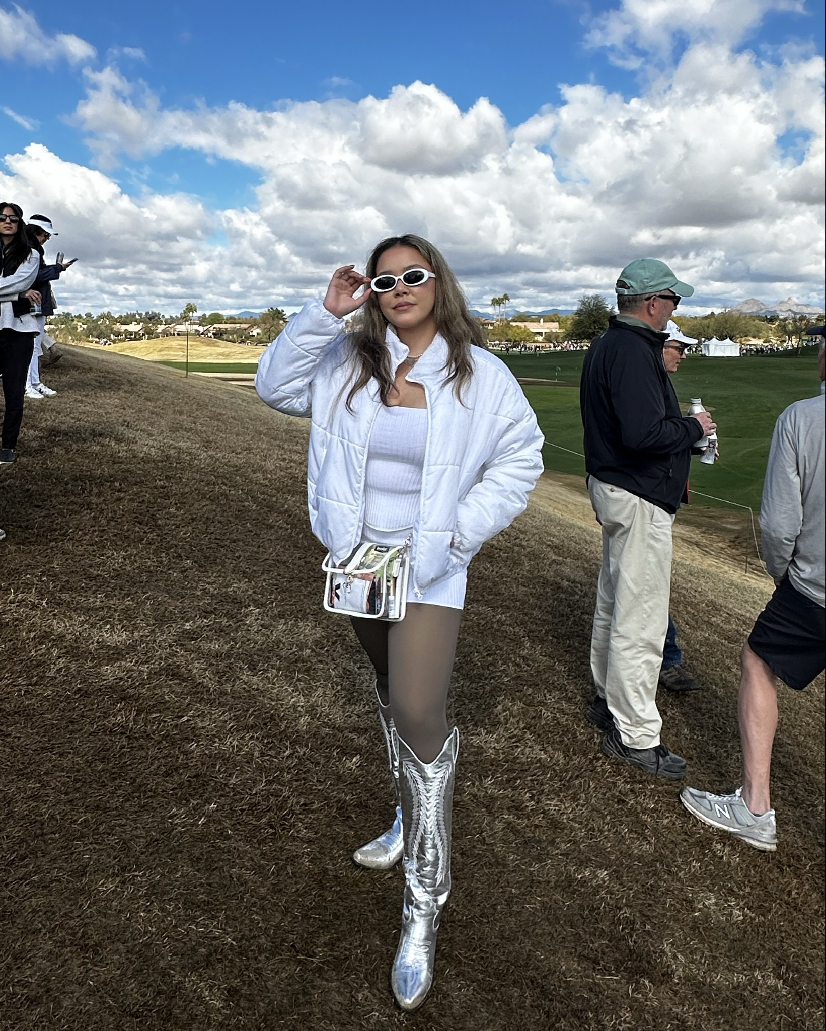 Wore this outfit to the Waste Management Phoenix Open this year! Love this marching set from Amazon - I love mixing and matching the top and bottom with other outfits too! They’re also more flattering, when you’re not wearing tights underneath!

Sizing:
Set: M
Cowboy Boots: 8
Tights: L-XL
Puffer Jacket: L

#LTKfindsunder100 #LTKmidsize #LTKSeasonal