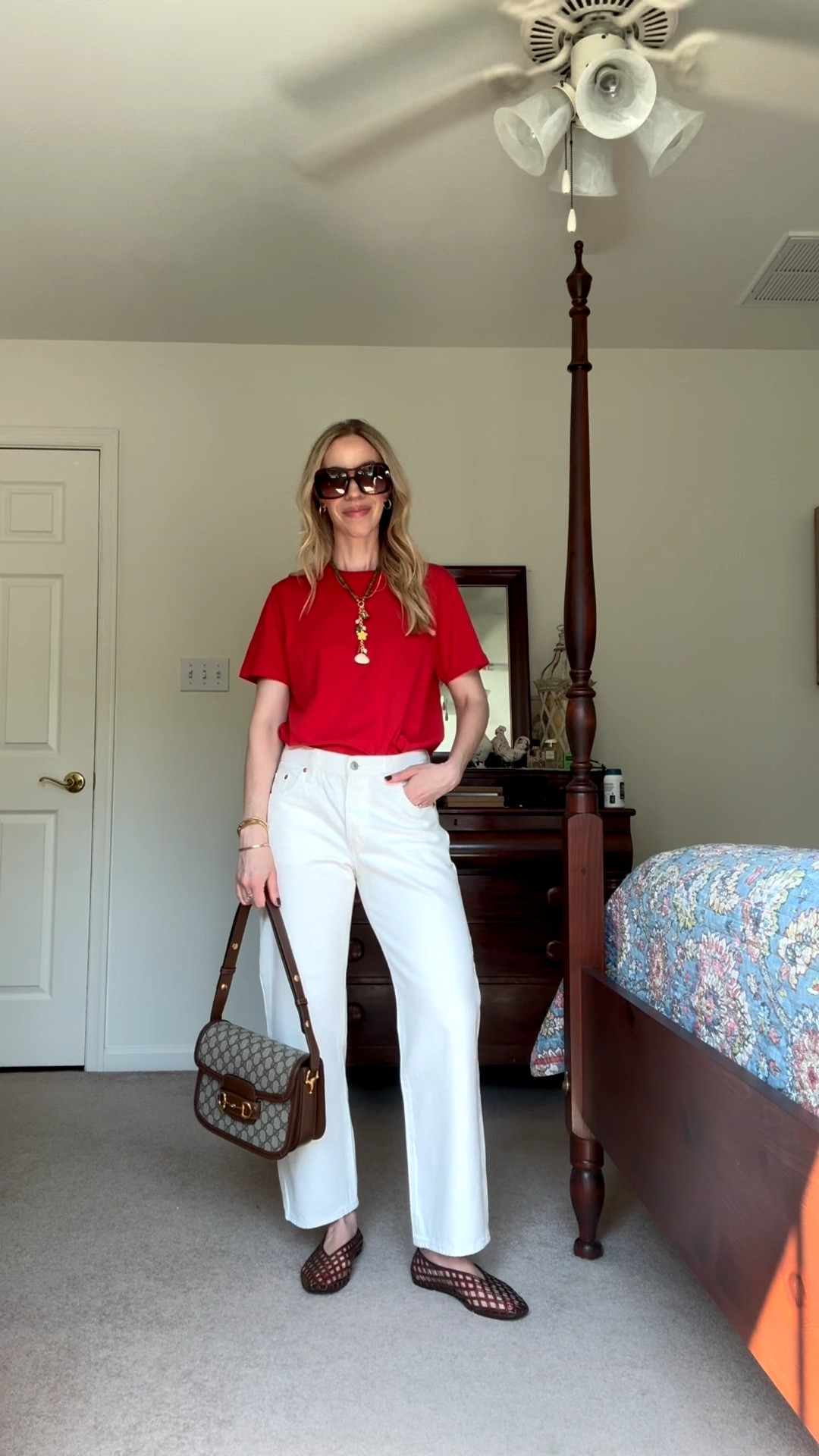 Casual summer outfit with red tee, @levi white baggy jeans, jelly shoes, shell necklace, Gucci bag

#LTKootd #LTKOver40 #LTKSeasonal