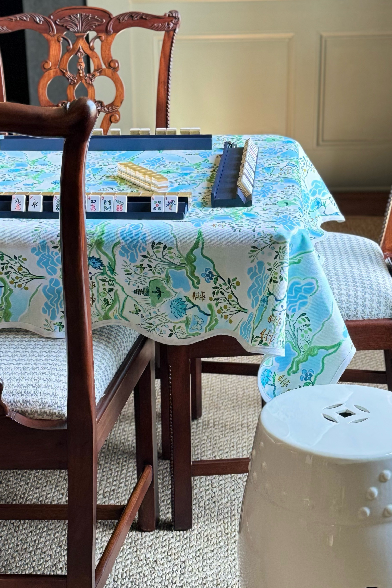 A garden stool is the perfect side table when playing mahjong.

___

Mahjong, mah jongg, garden stool, side table, table topper, square tablecloth

#LTKstyletip #LTKover40 #LTKhome