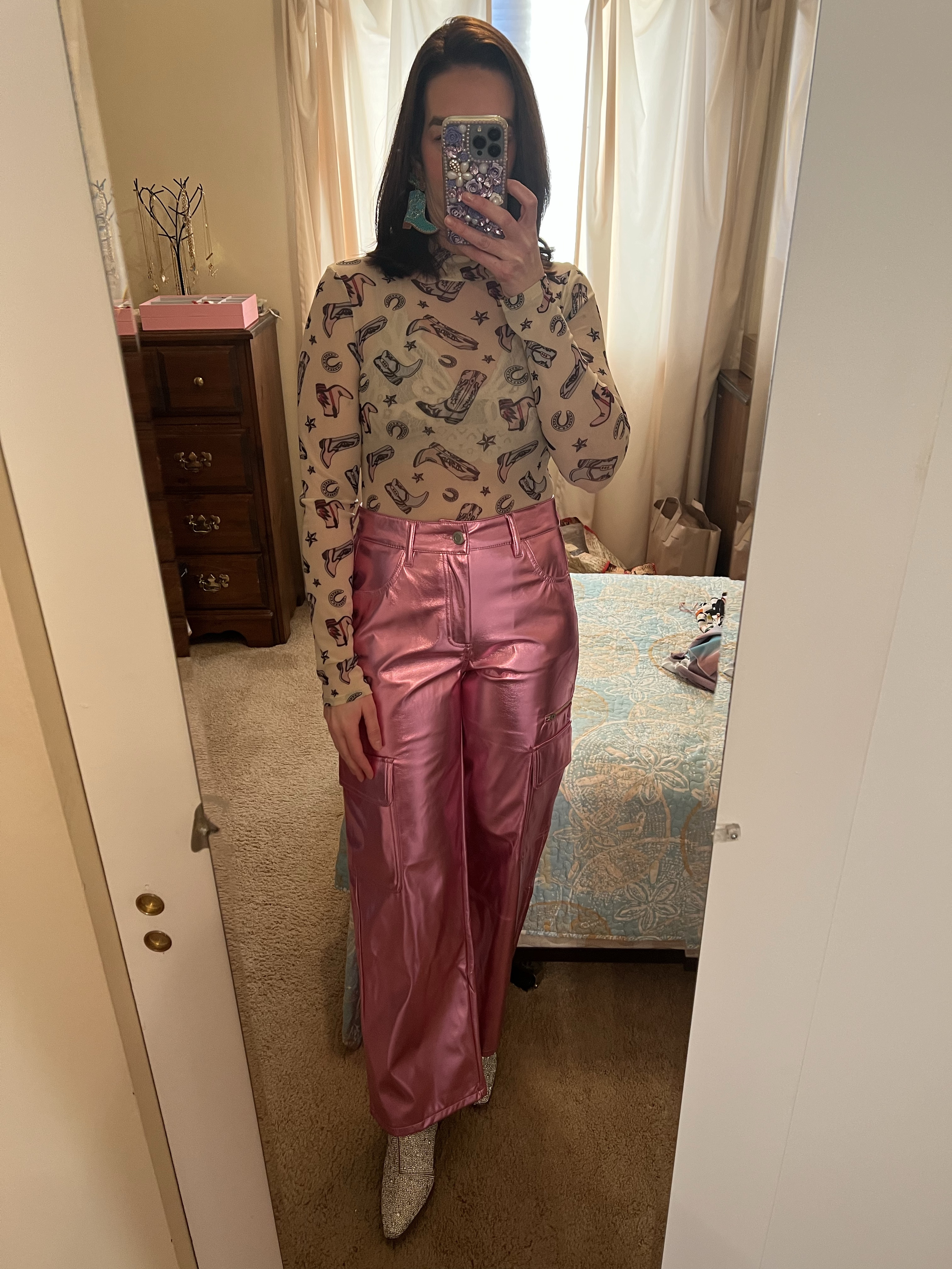 Cowboy boot long sleeve bodysuit (small). Pink metallic cargo pants (small). Turquoise rhinestone cowboy boots (8.5). #cowboyboots #longsleevebodysuit #bodysuit #boots #turquoiseboots #rhinestoneboots #cargopants #pants #pinkpants #metallicpants #countryconcertoutfit #concertoutfit 
Western Outfit 

#LTKSeasonal #LTKStyleTip #LTKFindsUnder100