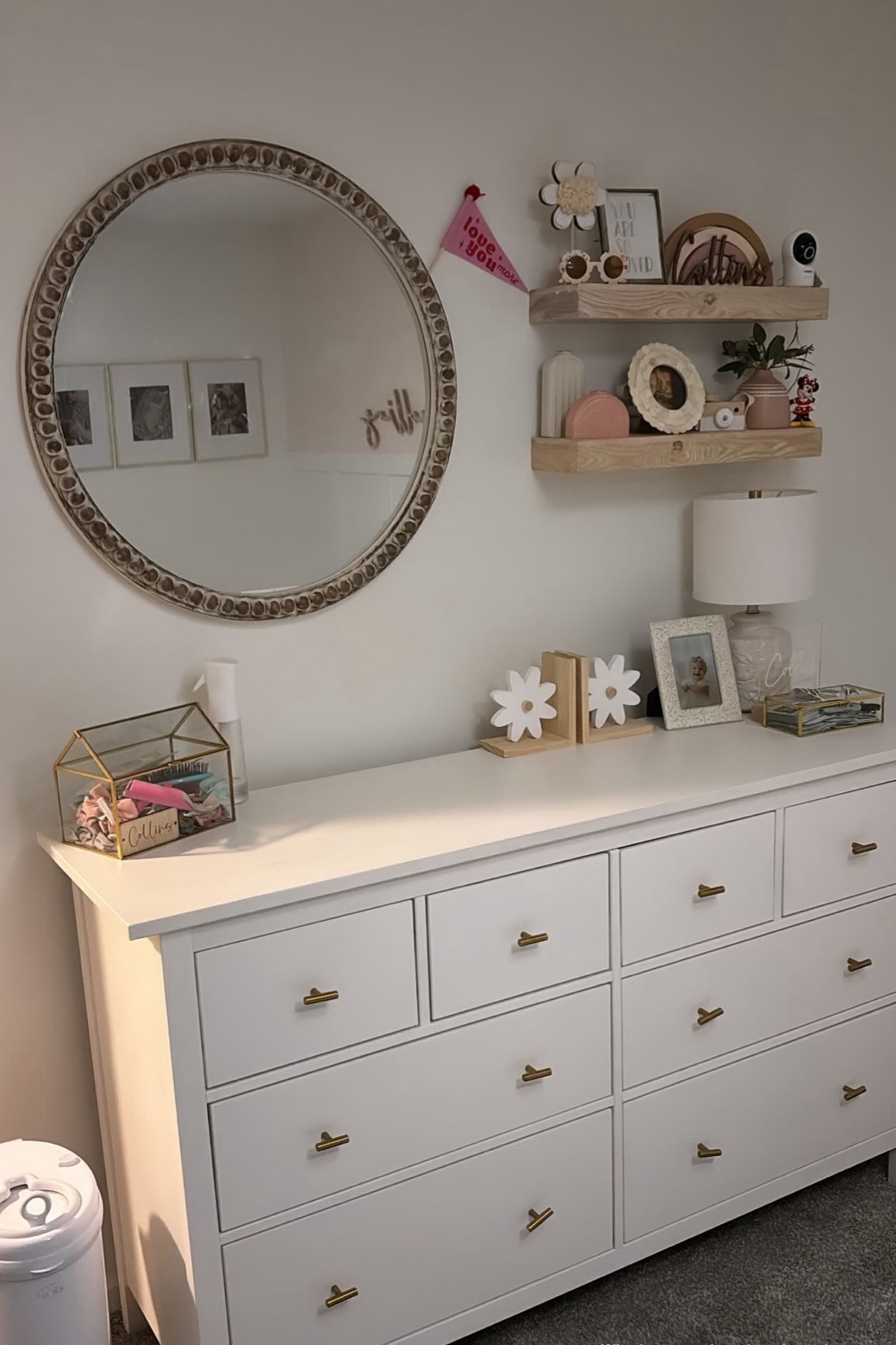 Baby girl nursery 
Neutral nursery 
Boho nursery
Bow storage
Bow organization
Toddler room 
Toddler room ideas 
Bedroom storage 
IKEA dresser 
White dresser 
Dresser changing table 
Beaded wood mirror 
Floating wood shelf 
Shelf decor 
Nursery decor 

#LTKhome #LTKkids #LTKbaby