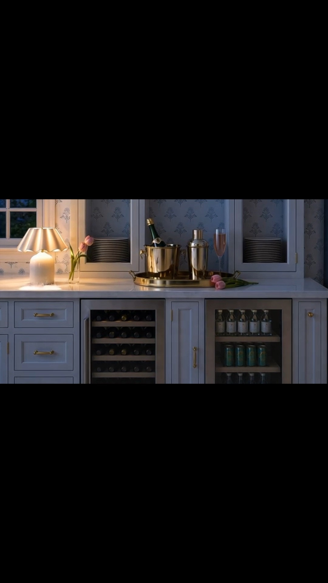 An evening bar moment at home. 🥂

As the evening settles in, this built-in station shifts into the perfect home bar for a glass of wine, a cocktail, or effortless entertaining. Soft cabinet lighting makes the pink glassware glow, while the brass barware adds just the right touch of glamour. With an under-counter wine cooler and beverage fridge keeping everything perfectly chilled, every detail is ready for the evening.

Cheers to a beautiful night at home. ✨

#HomeBar #BarStation #EveningAtHome #CocktailHour #WineCooler #BeverageFridge #UnderCounterFridge #Barware #Drinkware #PinkGlassware #RechargeableTableLamp #Wallpaper #BuiltInBar #EntertainingAtHome #KitchenDesign #LTKHome #LTKDayInMyLife #LTKVlog

#LTKdayinmylife #LTKHome #LTKSaleAlert