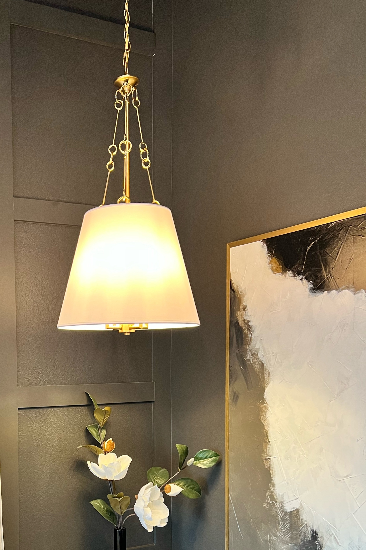 The most STUNNING pendant light! Brass and white shade pendant  

#LTKhome #LTKsalealert #LTKstyletip