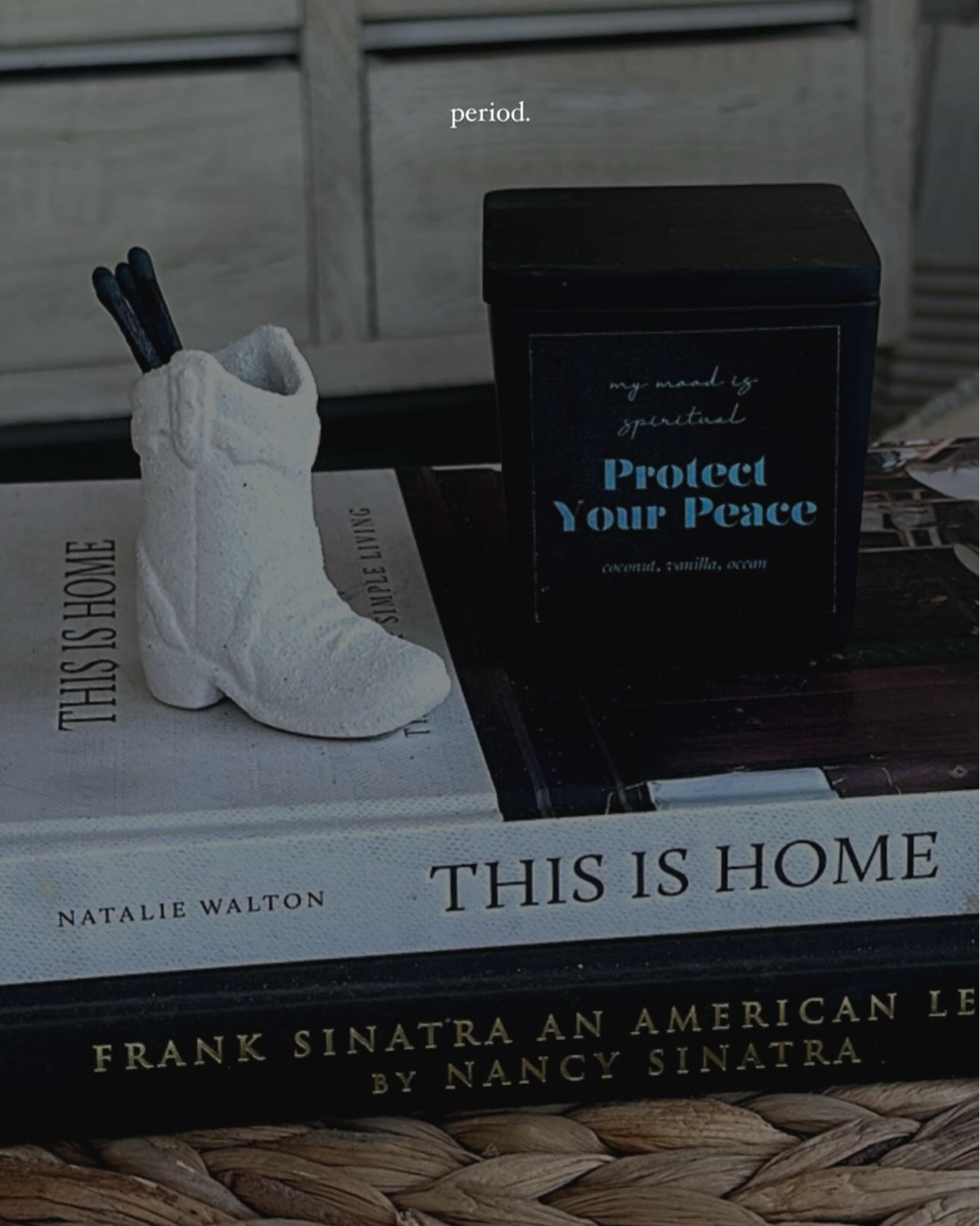 Cowboy boot match holder & This Is Home Coffee Table book 