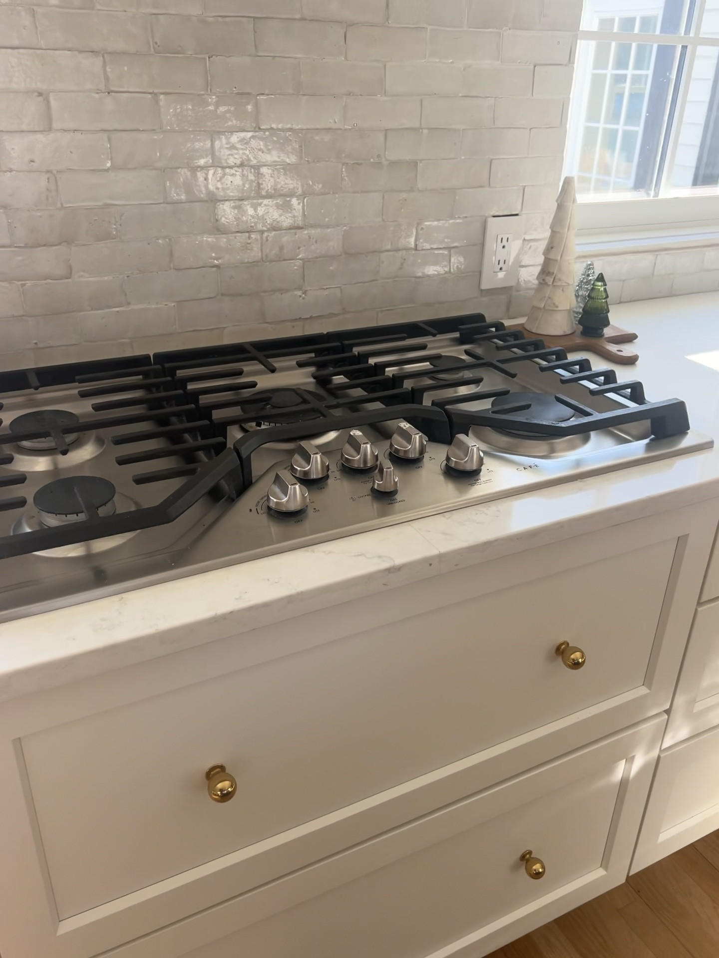 Café five burner stainless steel gas cooktop, stove, kitchen, kitchen renovation we have had ours for 3 years with no problems. Love how sleek and easy it is to clean

#LTKhome #LTKsalealert #LTKCyberWeek