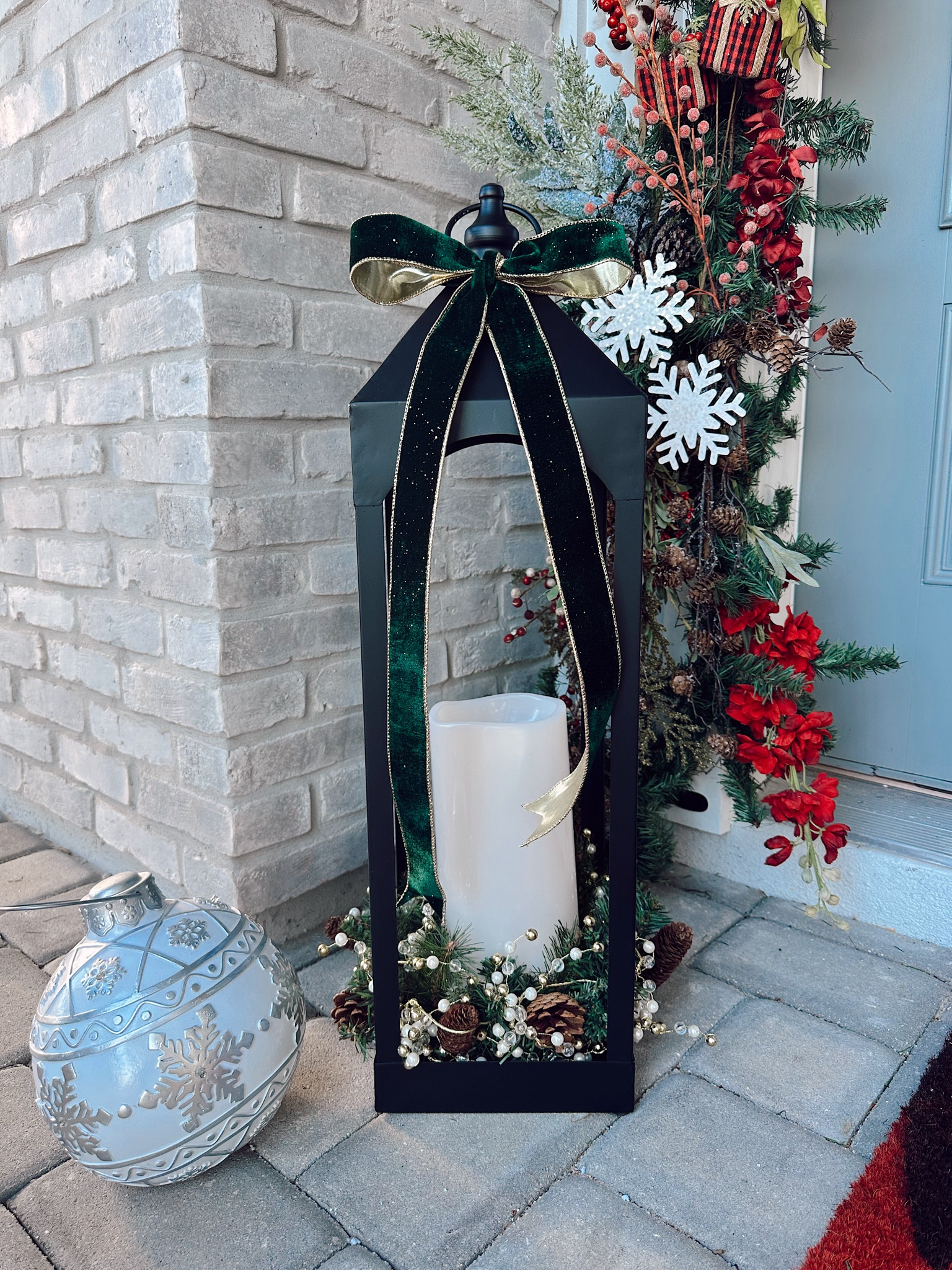 These lanterns added the perfect glam to our front door this Christmas season! 

#christmas #outdoordecor #christmasdecor #home 

#LTKSeasonal #LTKhome #LTKHoliday