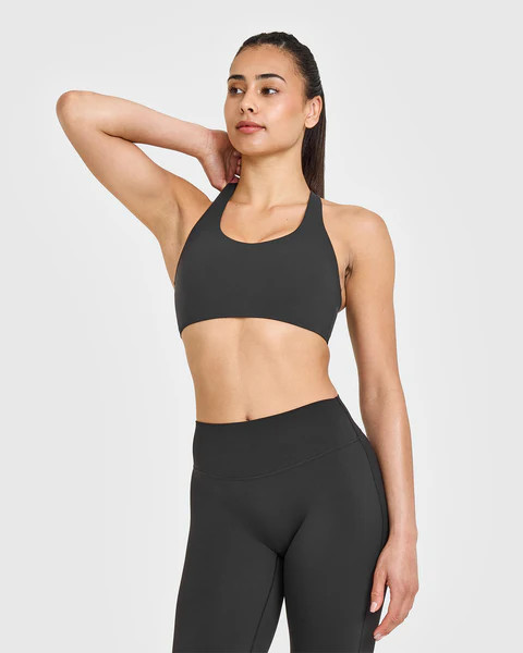 SoftMotion™ Sports Bra with White Logo 
 Soft Black | Oner Active (UK / US)