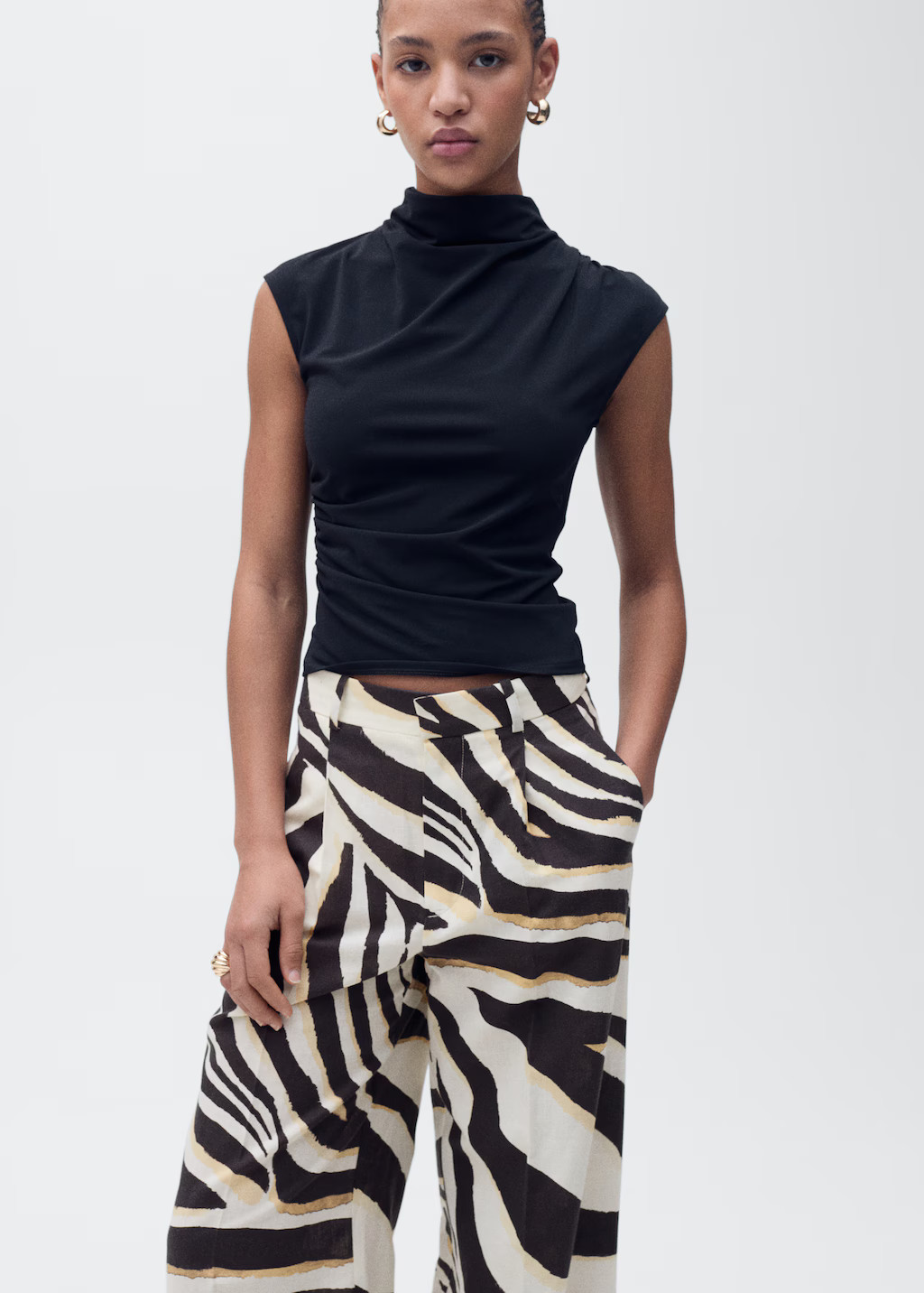 Zebra-print pleated wideleg trousers - Women | MANGO United Kingdom | MANGO (UK)