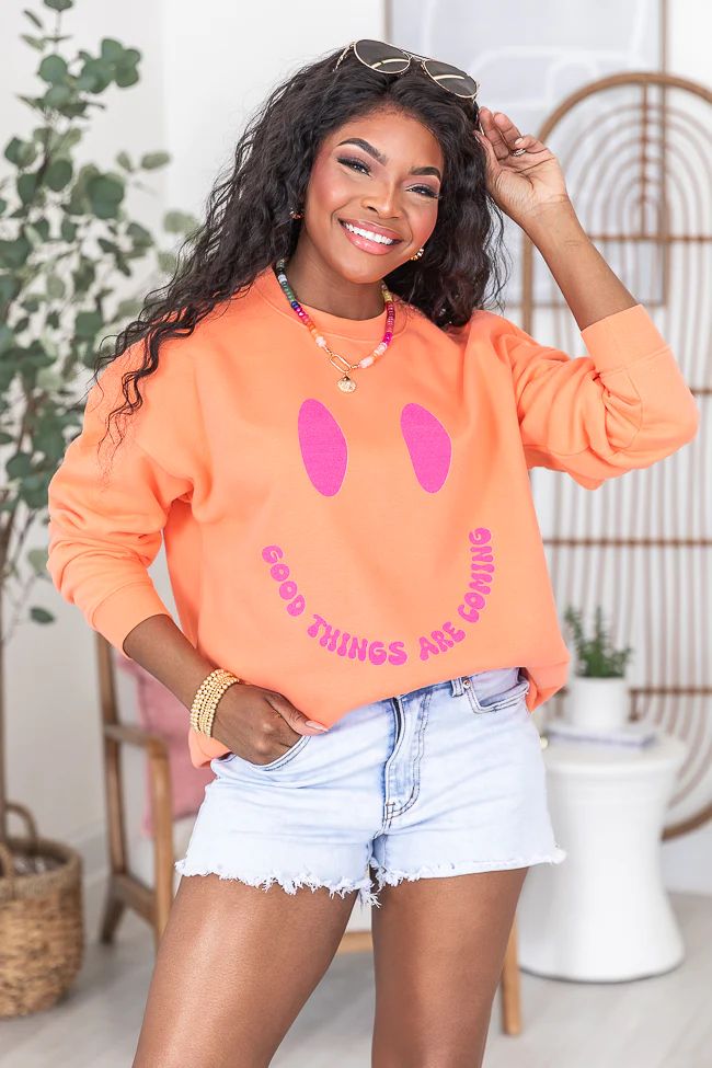 Good Things Are Coming Coral Oversized Graphic Sweatshirt | Pink Lily