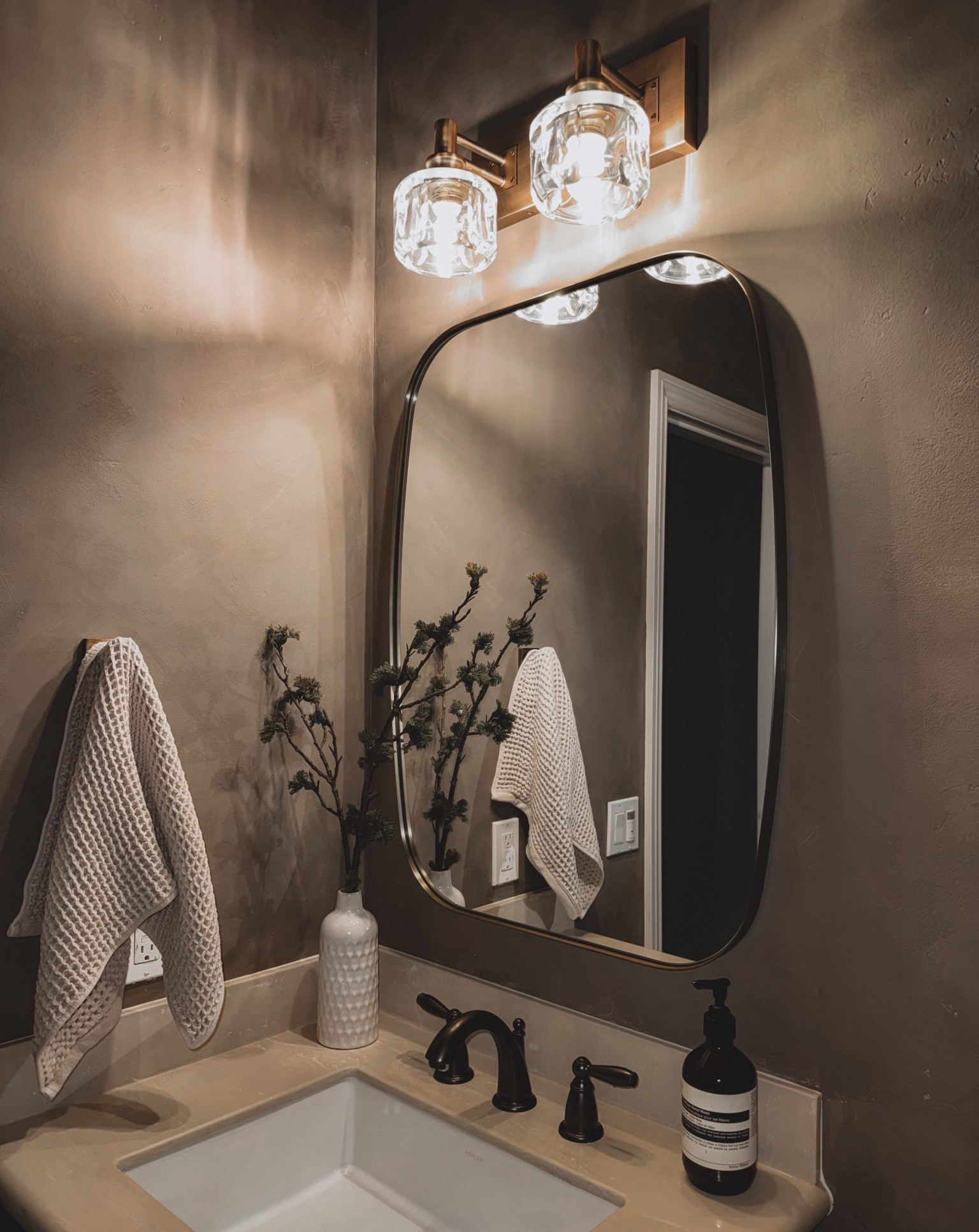 This Wayfair mirror is a 10/10! This is the brushed gold color and it’s perfect for this modern moody powder room. Super heavy and doesn’t distort. If you want to know my faux limewash technique, it’s in my previous posts 😊

#LTKHome