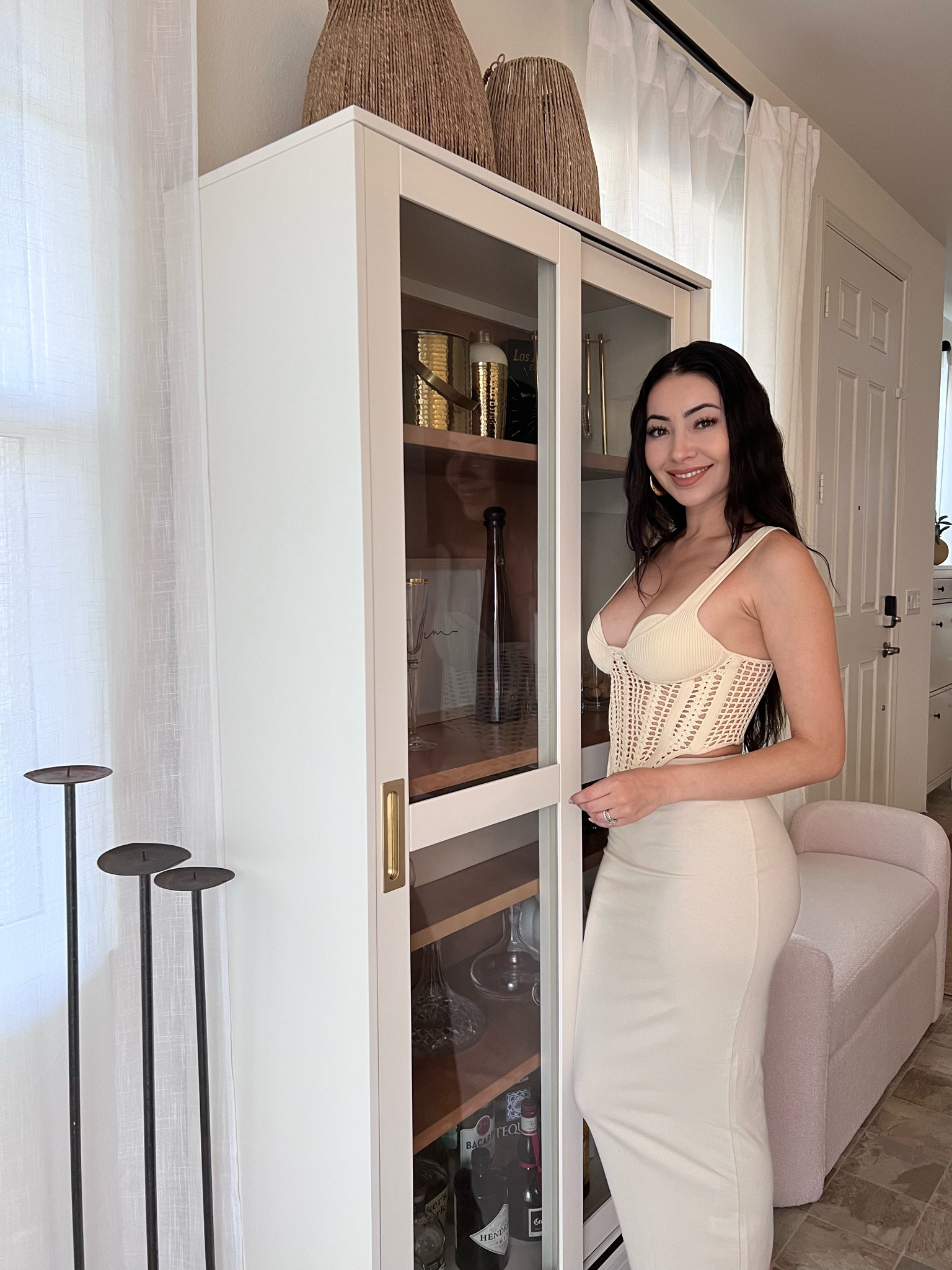 MY AT HOME BAR STATION!

Instead of using a bar cart, I decided on this cabinet with sliding glass doors in my dining room for storage of my bar essentials! 

I love that the glass doors keep the contents of the cabinet free from dust.

The white and beige wood match my neutral tone home decor perfectly!

#LTKhome #LTKHoliday