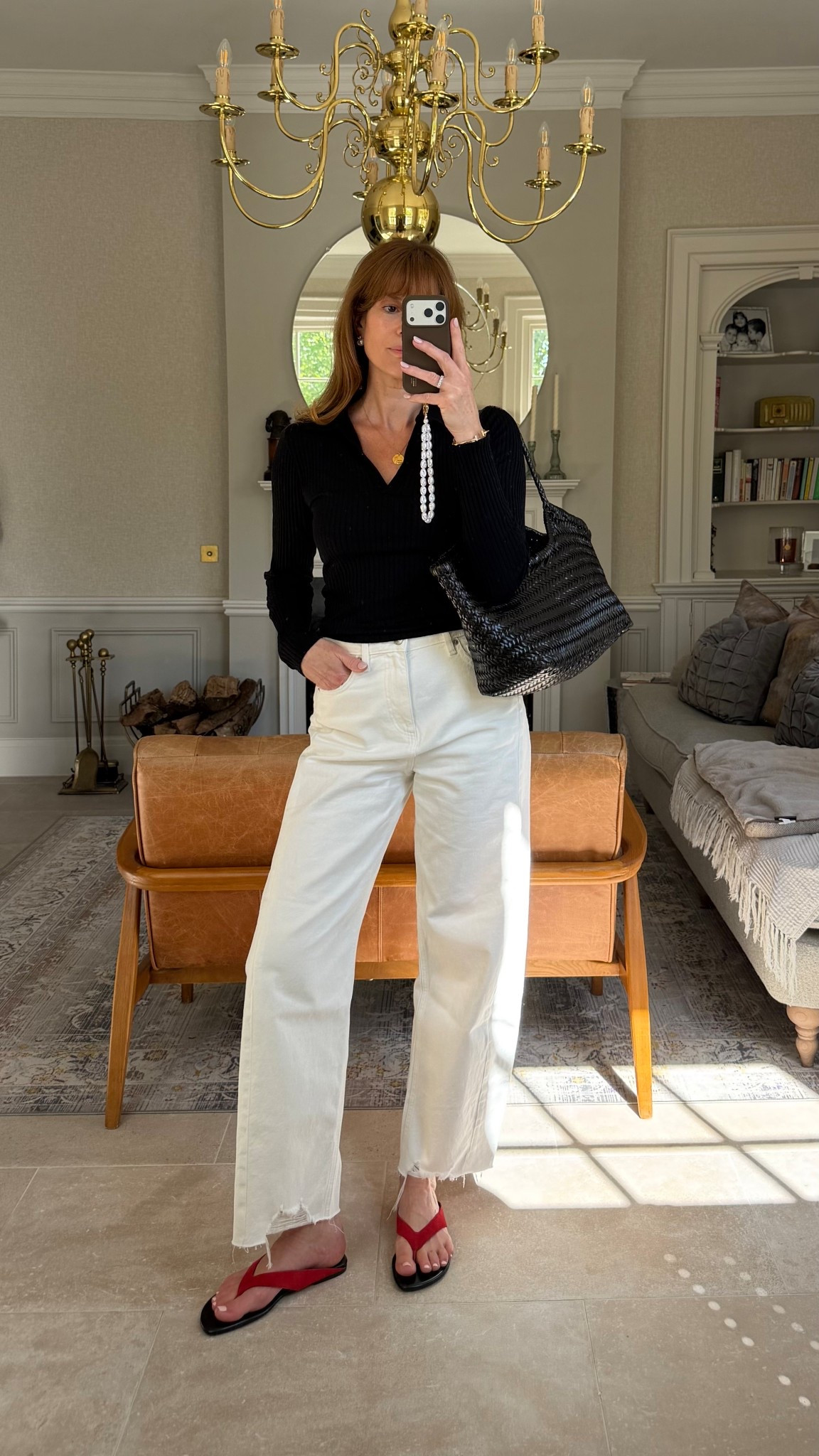 Pop of red
Red suede flip flops 
White barrel leg jeans
Black fitted polo top 

#LTKuk #LTKstyletip #LTKshoes