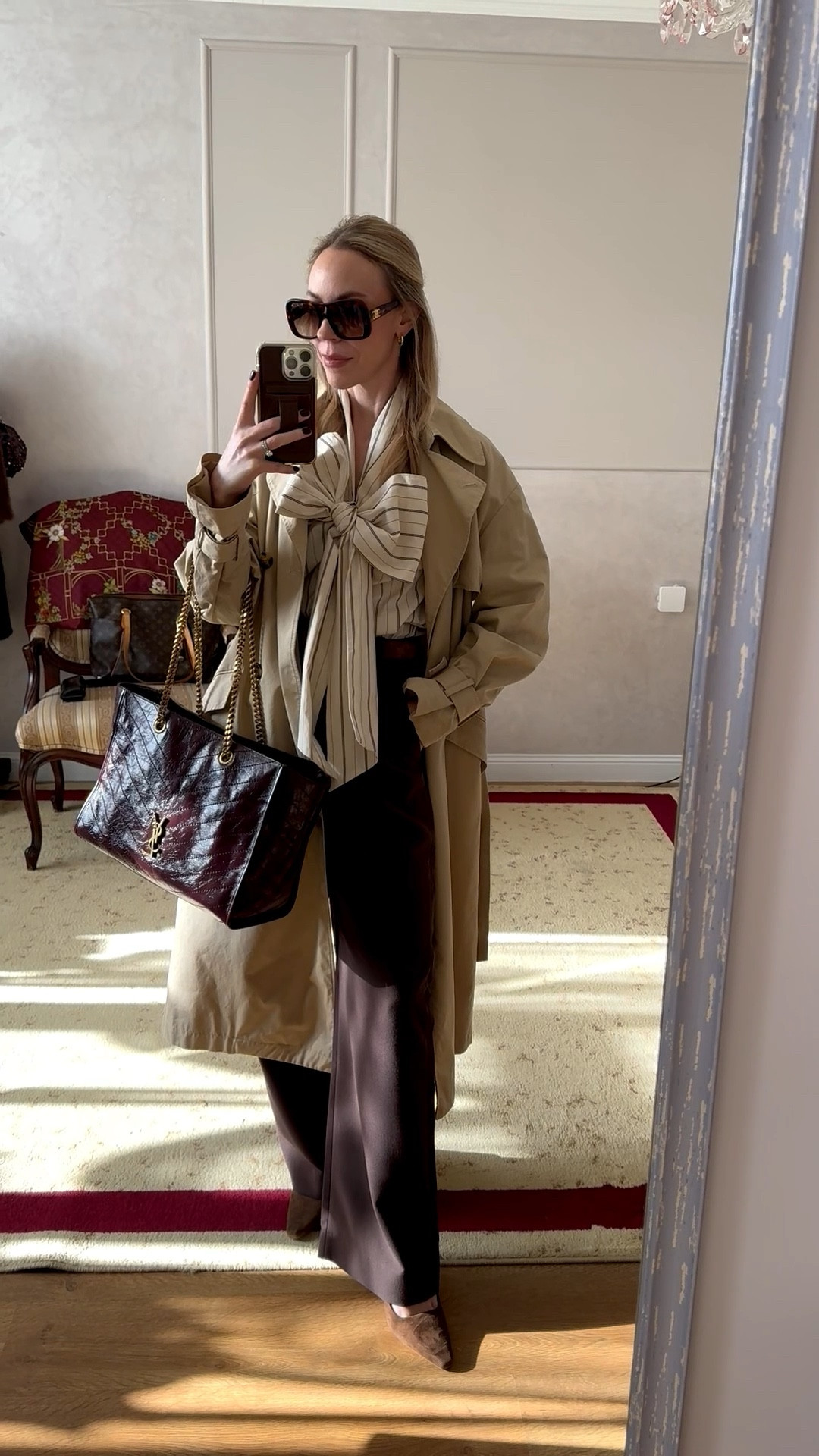 Spring work outfit, business casual, bow tie top, trench coat, chocolate brown trousers, burgundy YSL tote bag

#LTKWorkwear #LTKSeasonal #LTKOver40