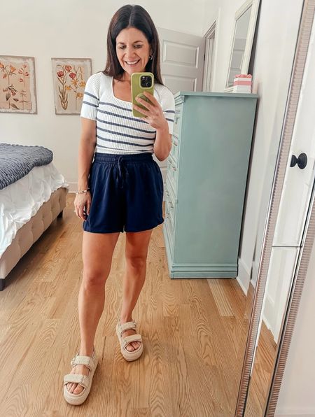 This is such a cute chic casual look, that is very on trend for this summer! I am pairing these drawstring navy lounge shorts with a square neck ribbed short sleeve striped knit top. I finished the look with these straw and good chunky dad sandals!



#LTKFindsUnder50 #LTKFindsUnder100 #LTKStyleTip